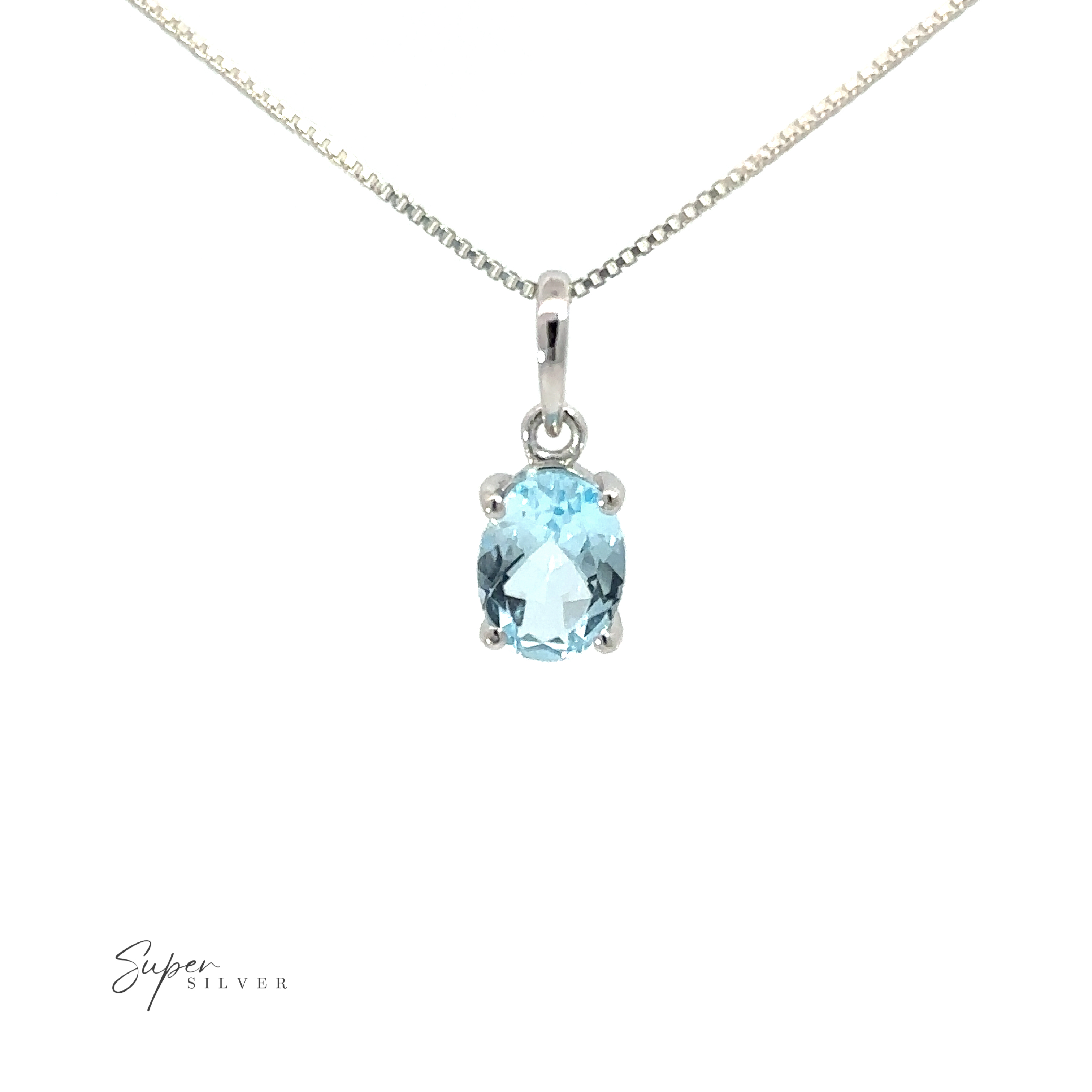 A minimalist silver chain necklace adorned with a tiny Dainty Faceted Gemstone Pendant.