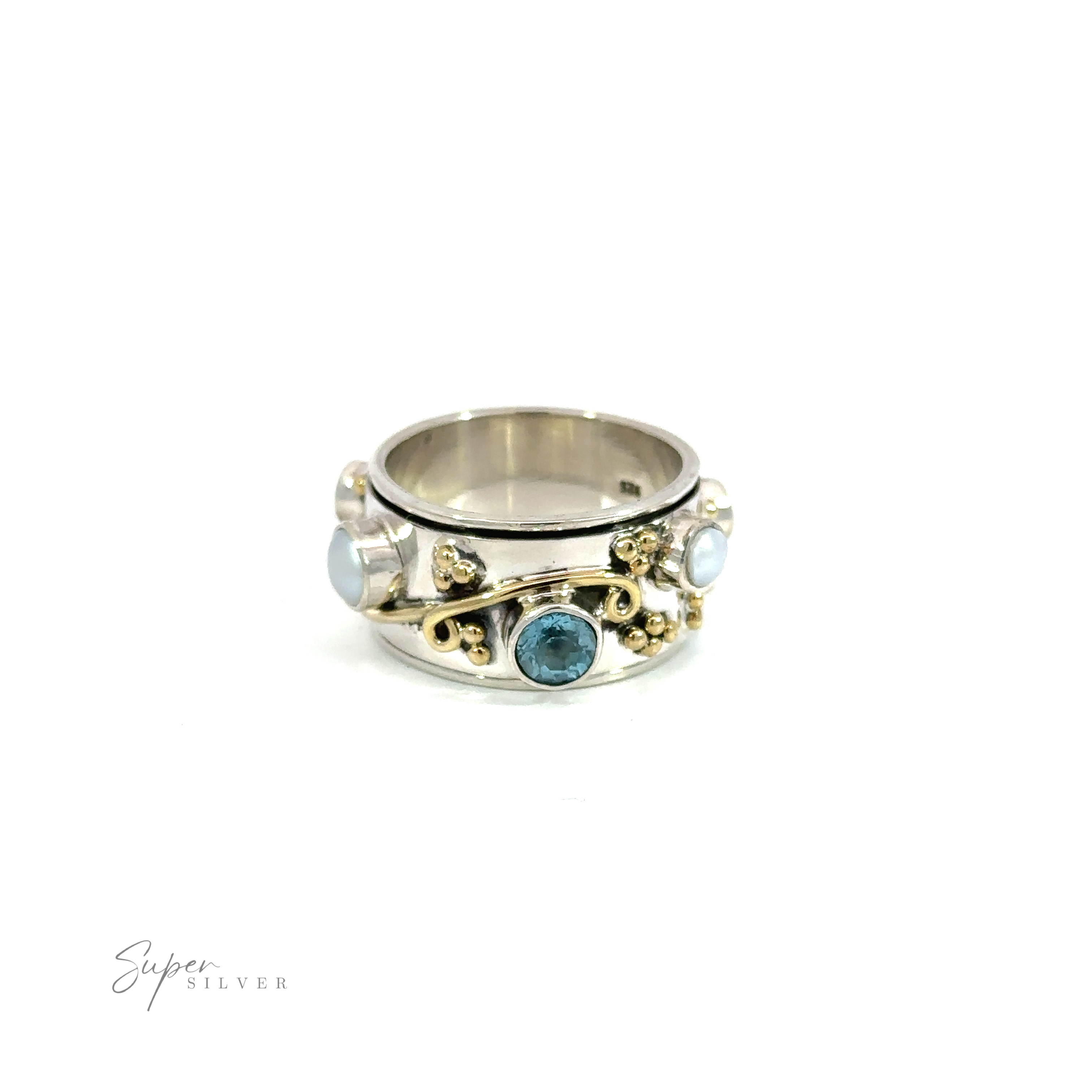 A Pearl and Blue Topaz Spinner with Gold Accents, crafted in Sterling Silver.