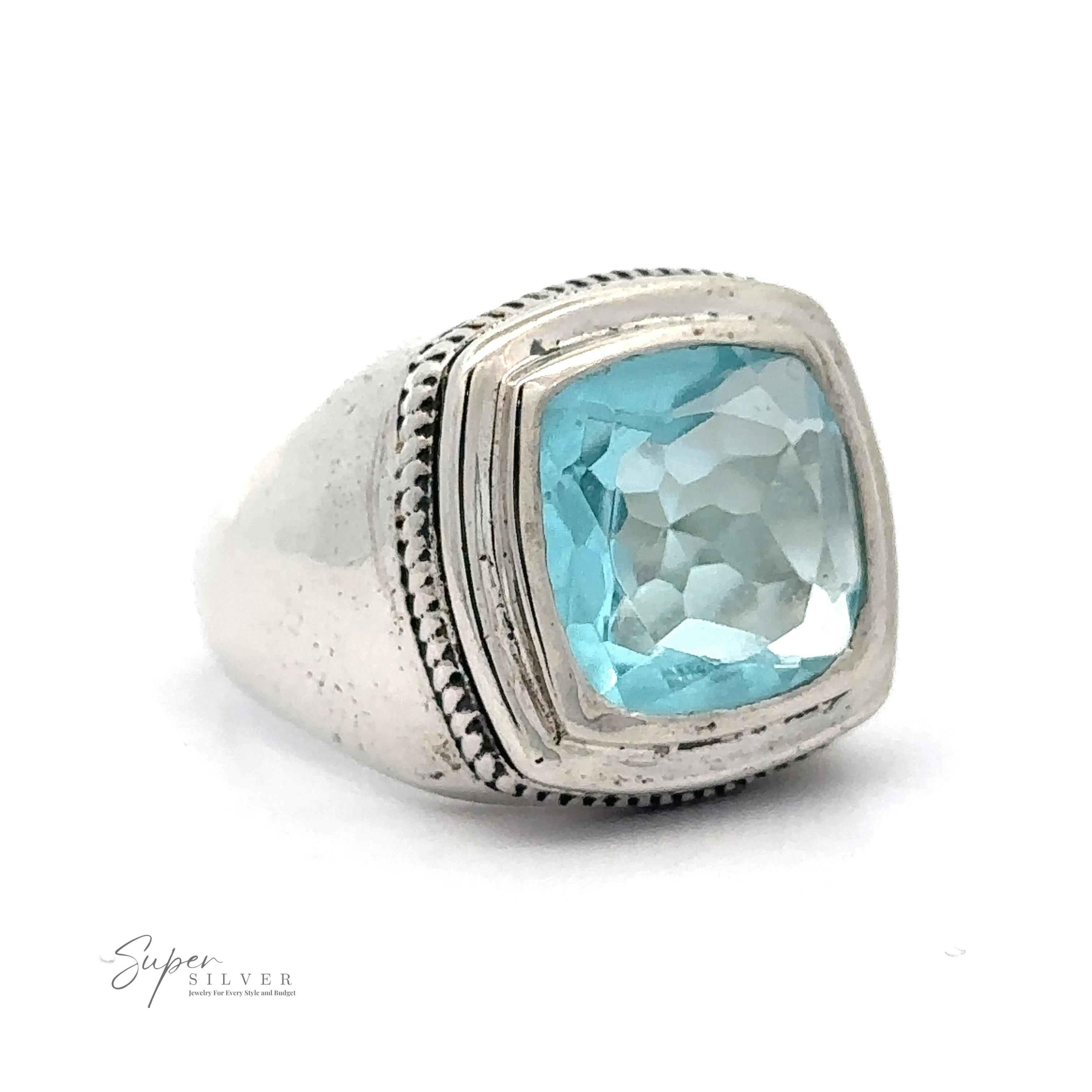 A Faceted Stone Signet Ring featuring a square-cut blue topaz gemstone with a faceted surface.