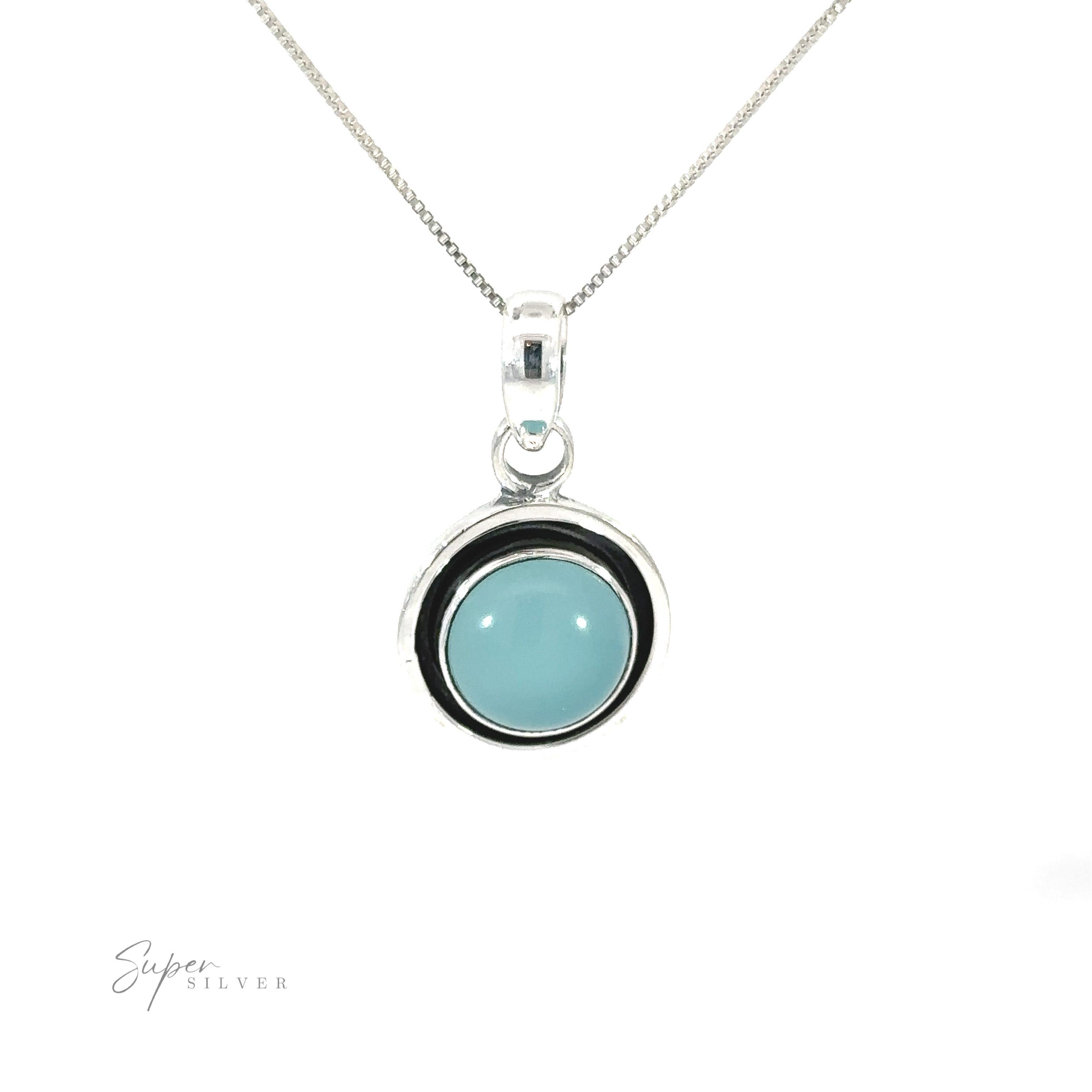 A Minimalist Round Gemstone Pendant with a blue and black stone and an oxidized edge.