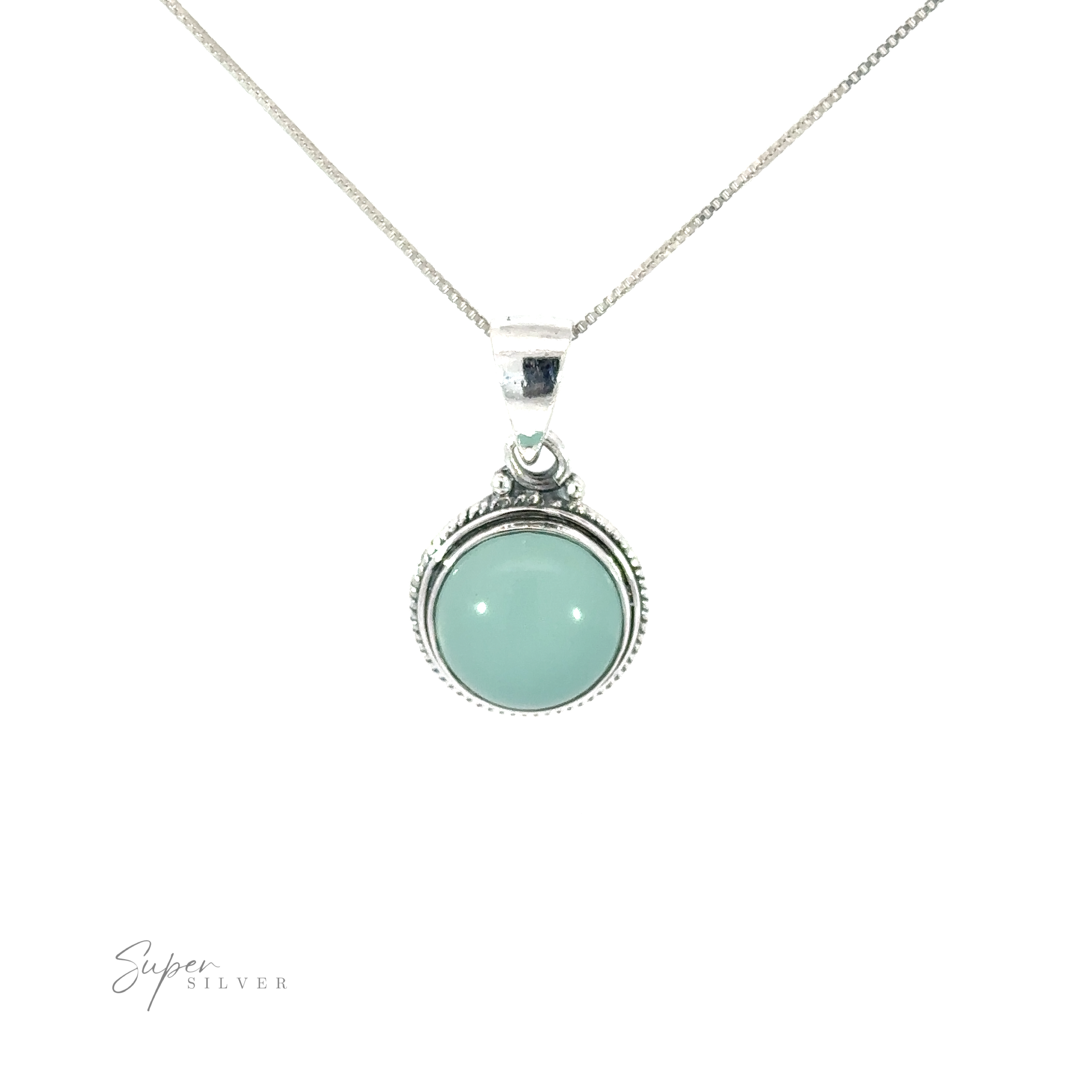 A Round Stone Pendant with Rope Border with a turquoise stone on it.