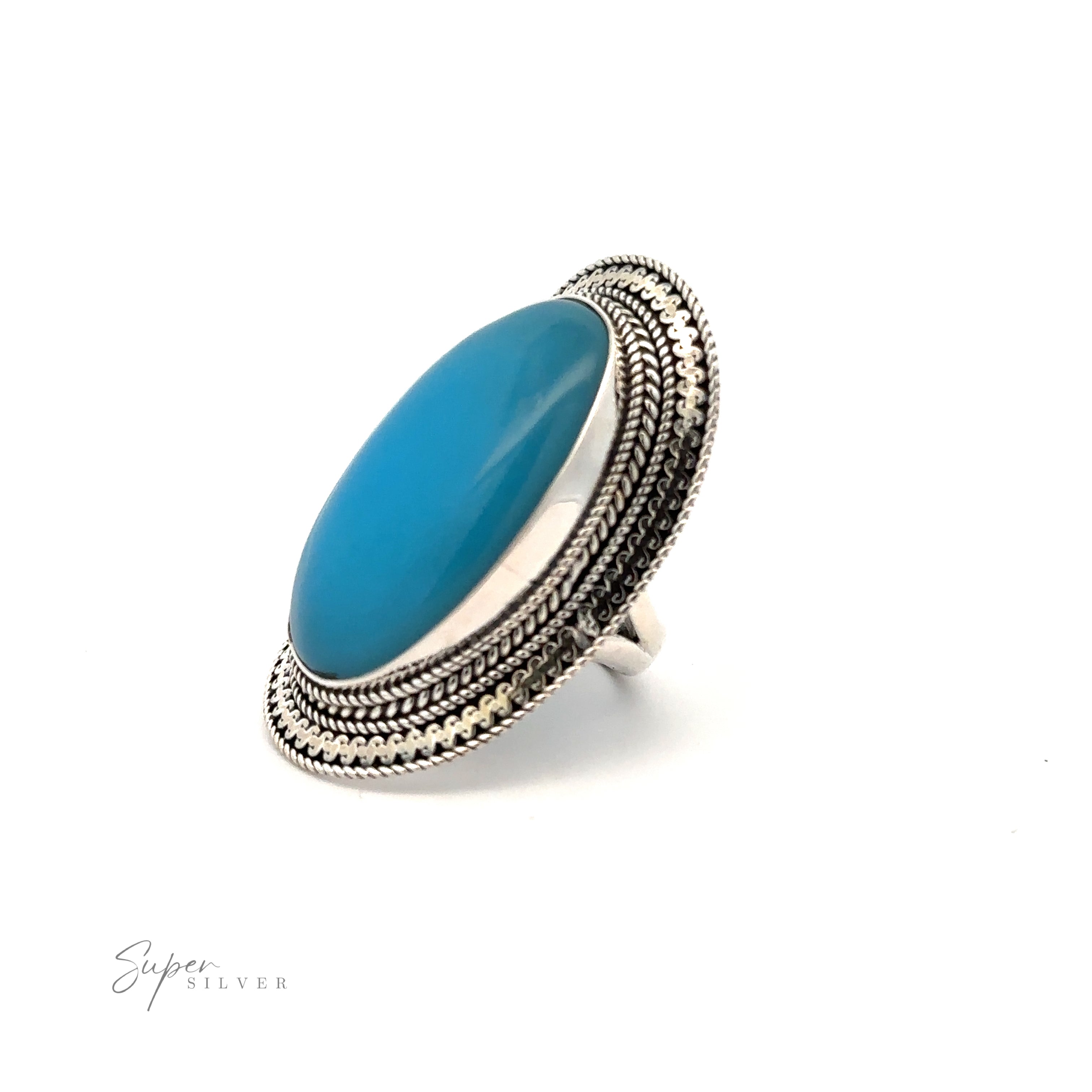 A Large Oval Shield Gemstone Ring, featuring intricate detailing around the setting and a touch of bohemian flair.