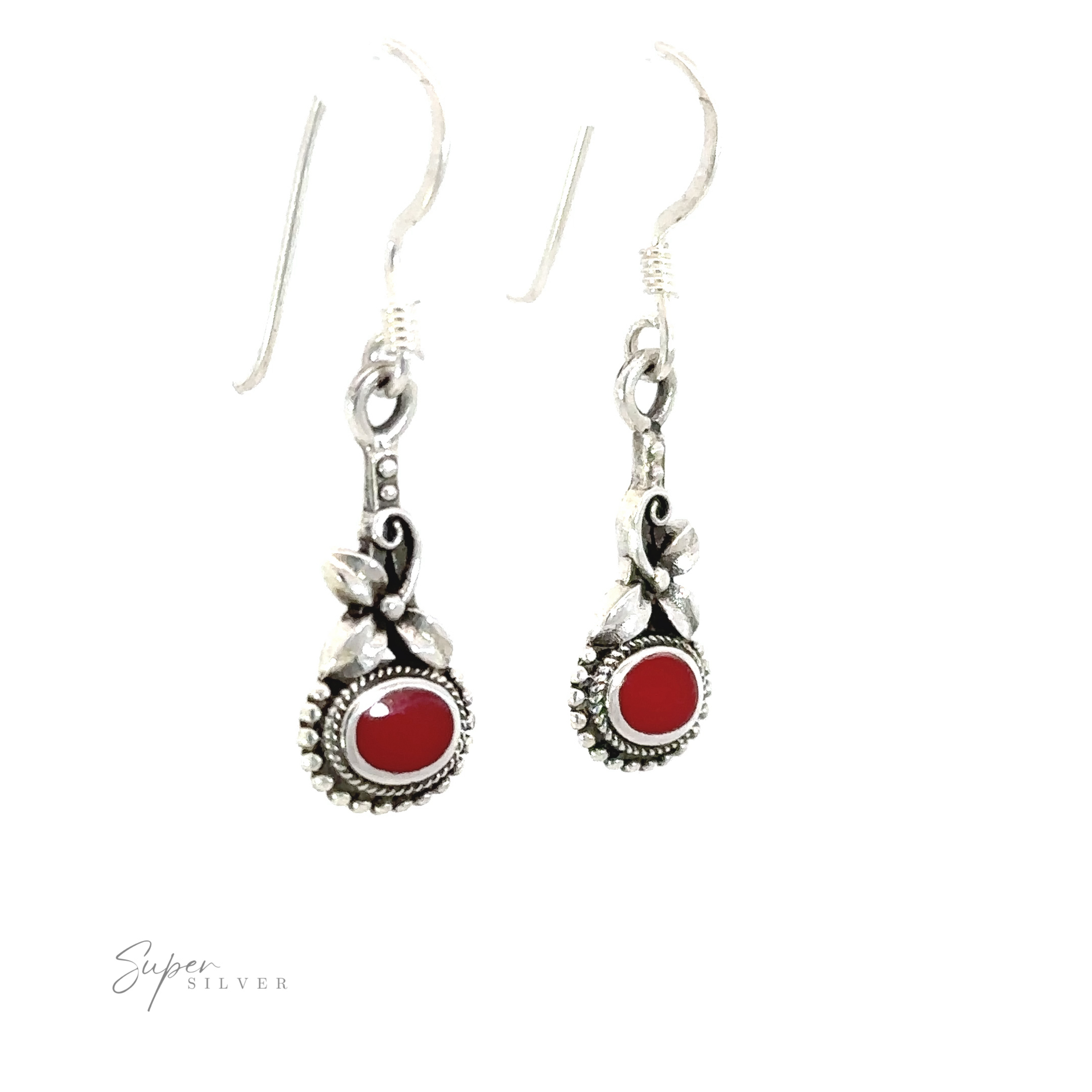 Inlaid Flower earrings with oval stones are the perfect accessory to add a touch of elegance to any outfit.