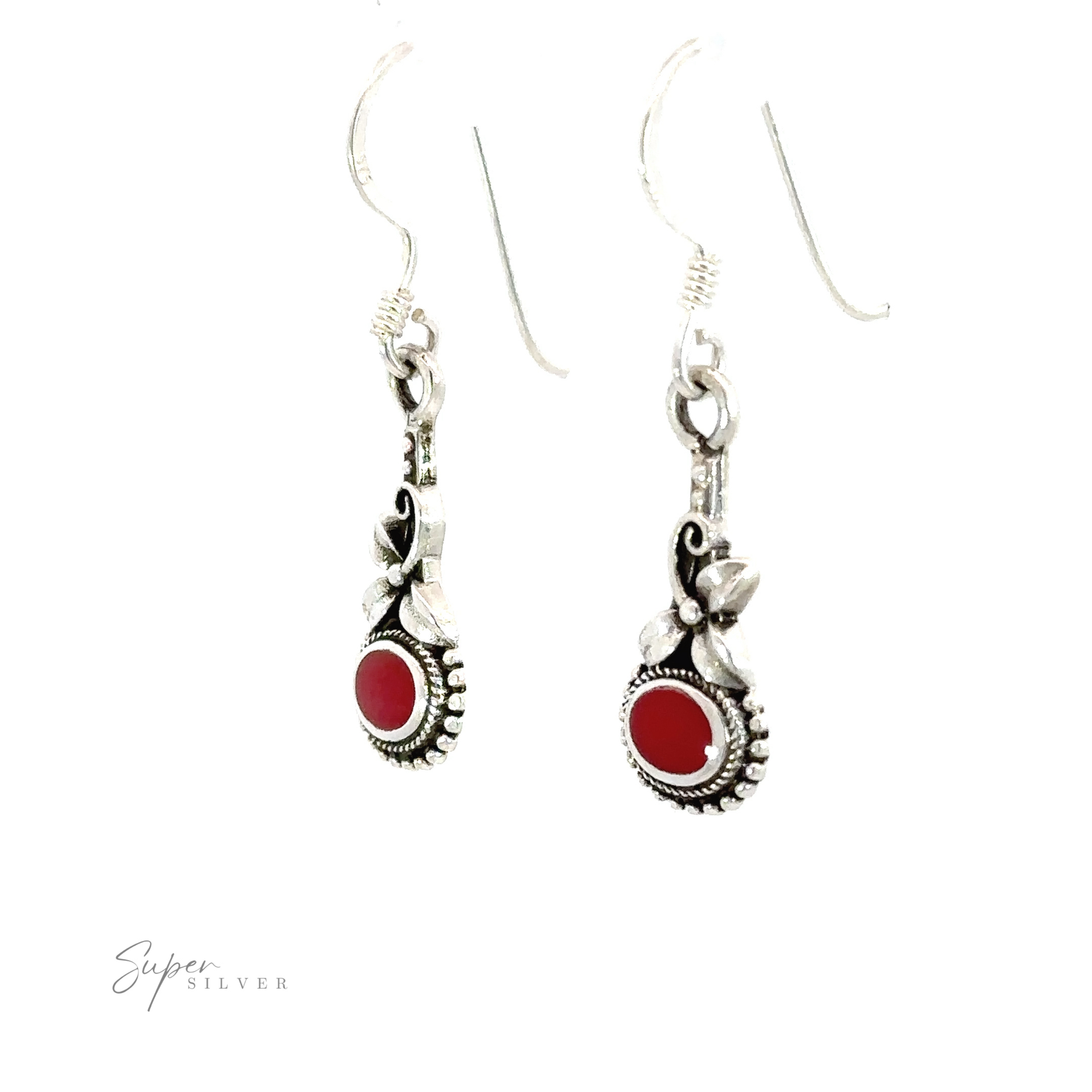 Inlaid Flower Earrings with Oval Stone: A pair of earrings with red stones that exude an effortless boho vibe.