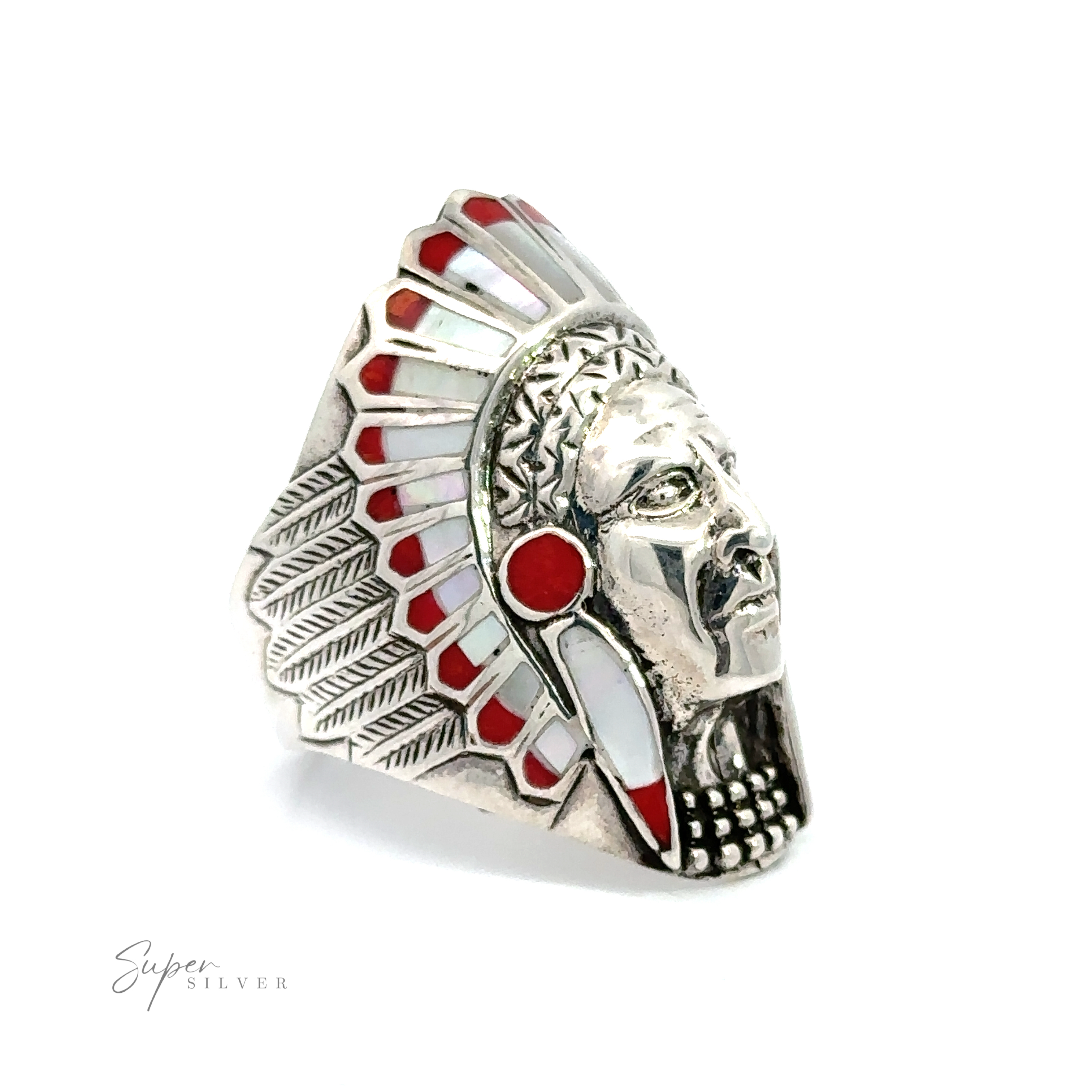 An Inlay Chief Ring with red and white stones, adorned in a traditional headdress.