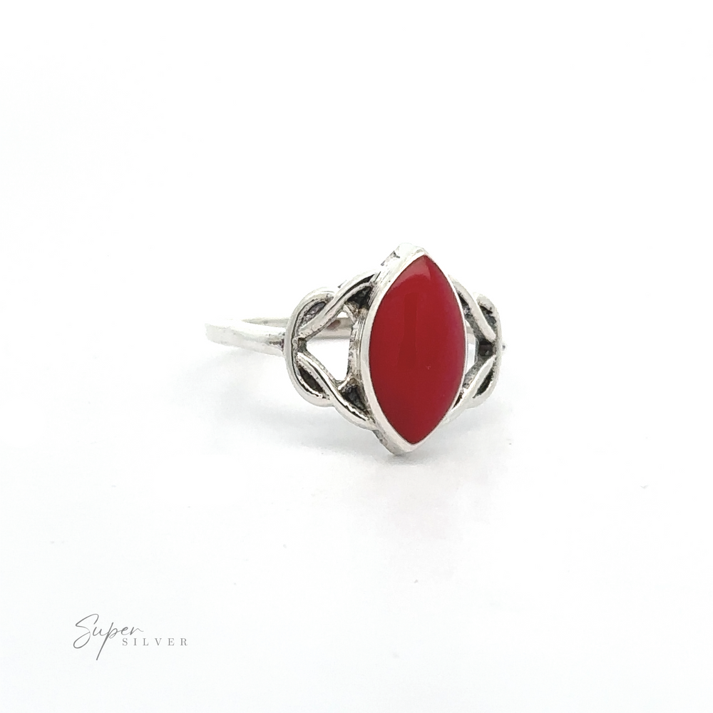 
                  
                    A Celtic Knot Marquise Inlaid Stone Ring with a red stone.
                  
                