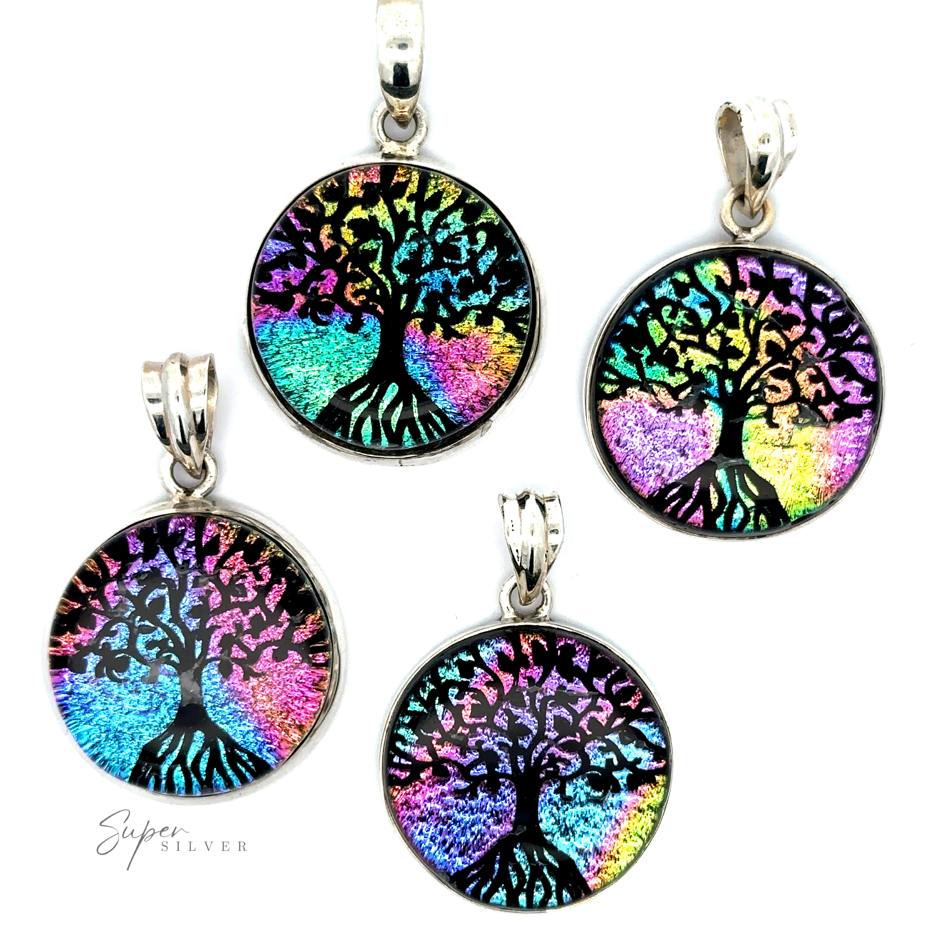 Four Dichroic Glass Tree Of Life Pendants featuring a vibrant Tree of Life design on a black background with the words "Super Silver" written in the bottom left corner.