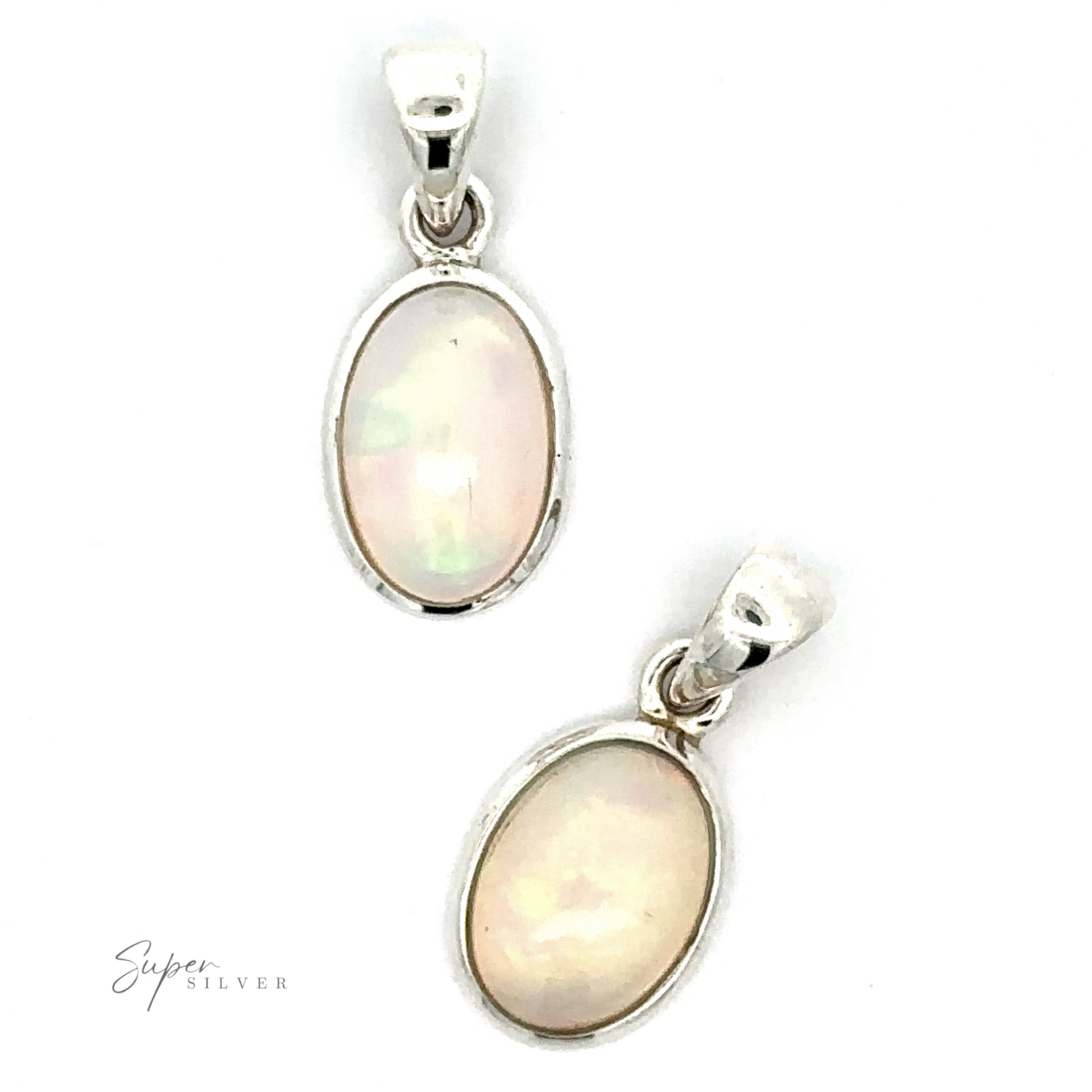 The Oval Ethiopian Opal Pendant showcases two exquisite oval-shaped gems set in sterling silver, complete with small loop bails that allow for easy attachment to a chain, embodying a minimalist aesthetic.