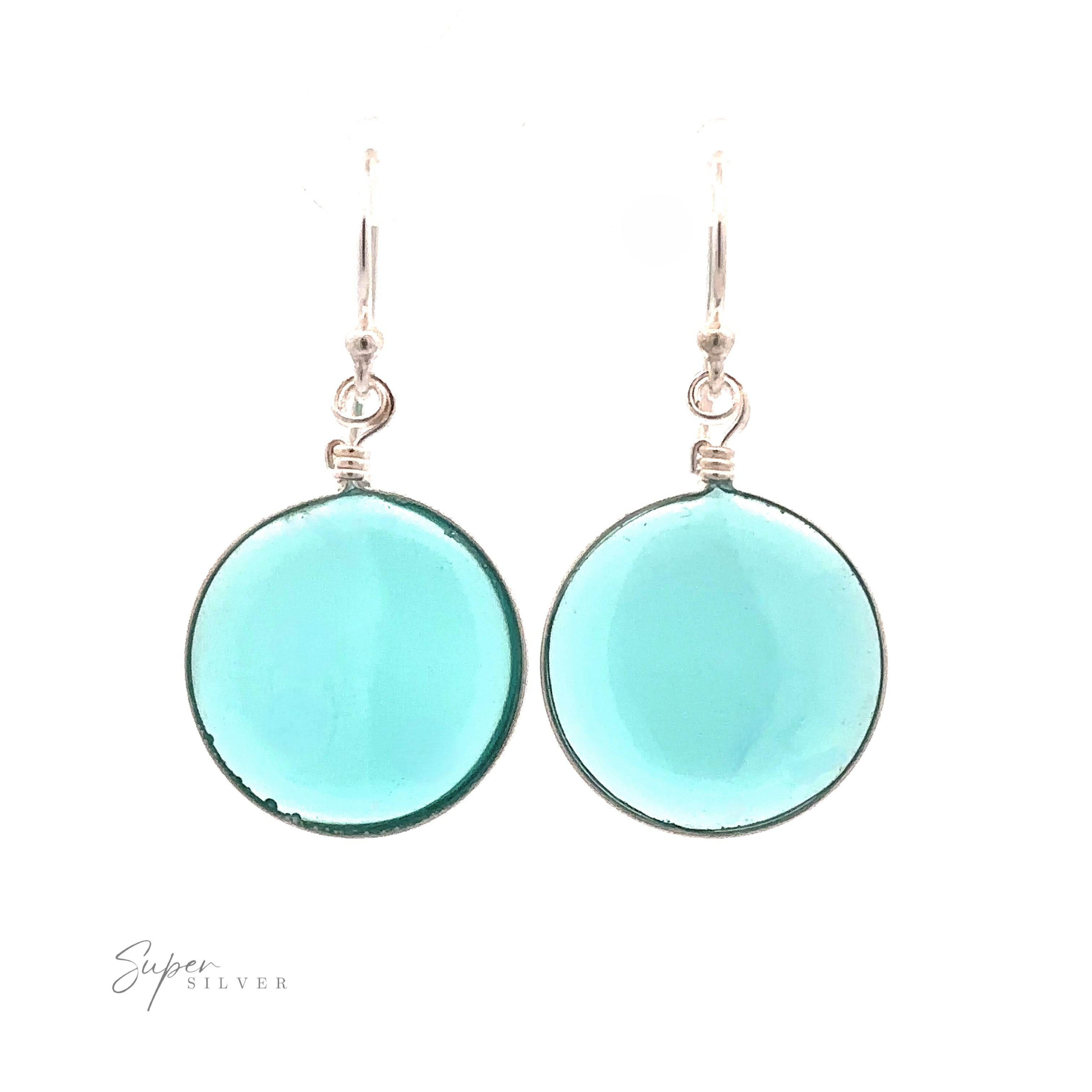 A simple set of Round Glass Earrings featuring round turquoise glass pendants.