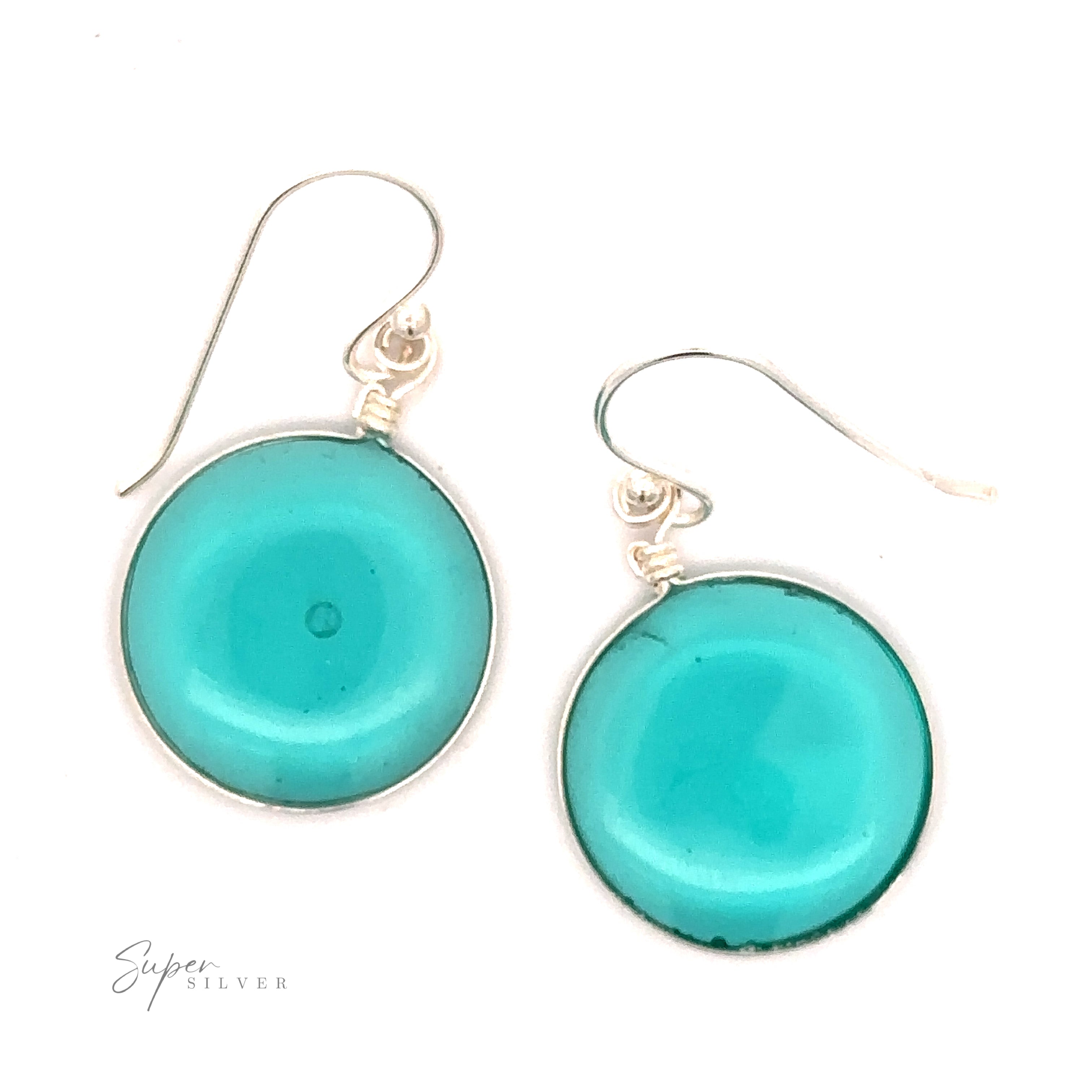 A pair of Round Glass Earrings with thin .925 Sterling Silver hooks displayed on a white background, showcasing a simple set with timeless elegance.