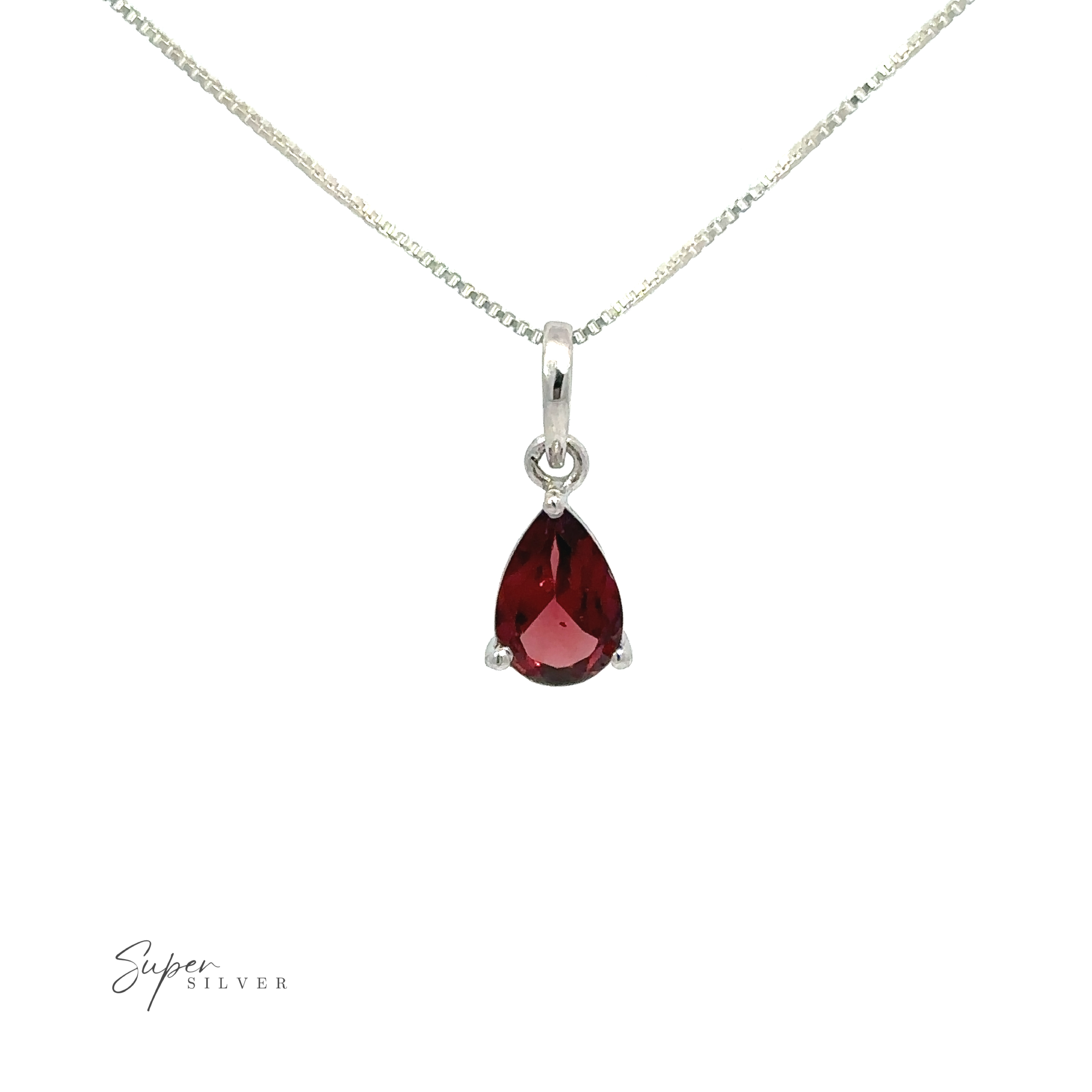 A close up of a necklace with a Dainty Faceted Gemstone Pendant, showcasing minimalist style.