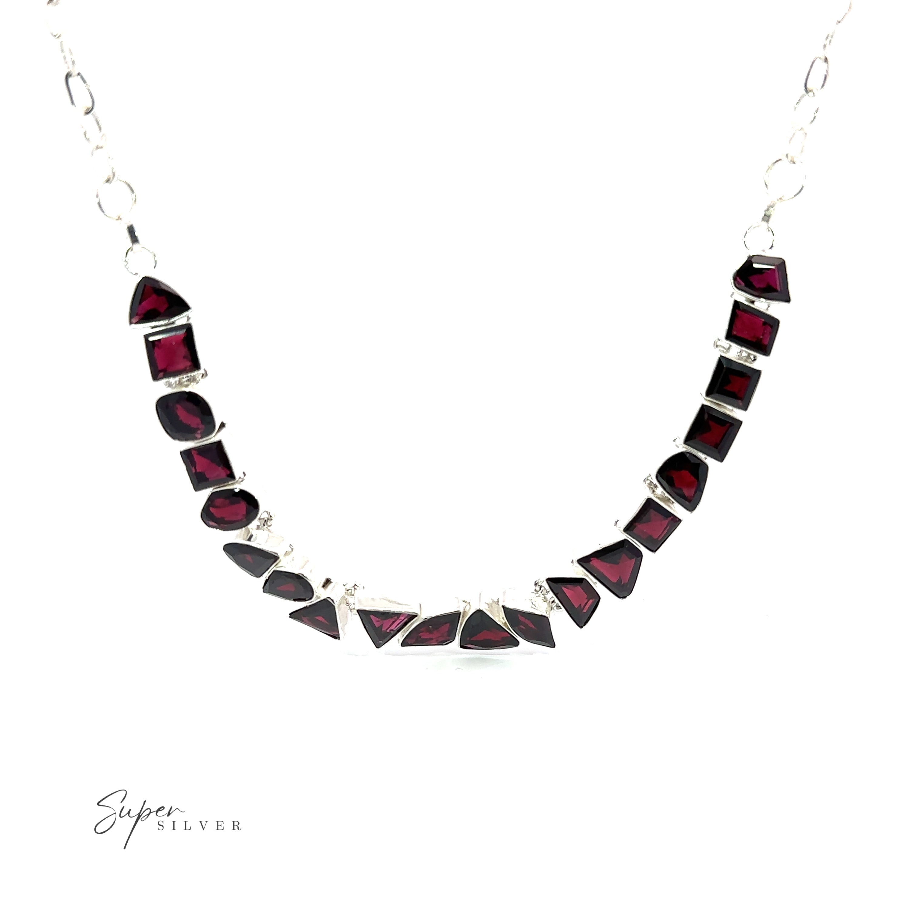 A Statement Gemstone Necklace featuring a series of deep red, irregularly shaped garnet stones, arranged in a curved pattern. The brand name "Super Silver" is visible in the bottom left corner.