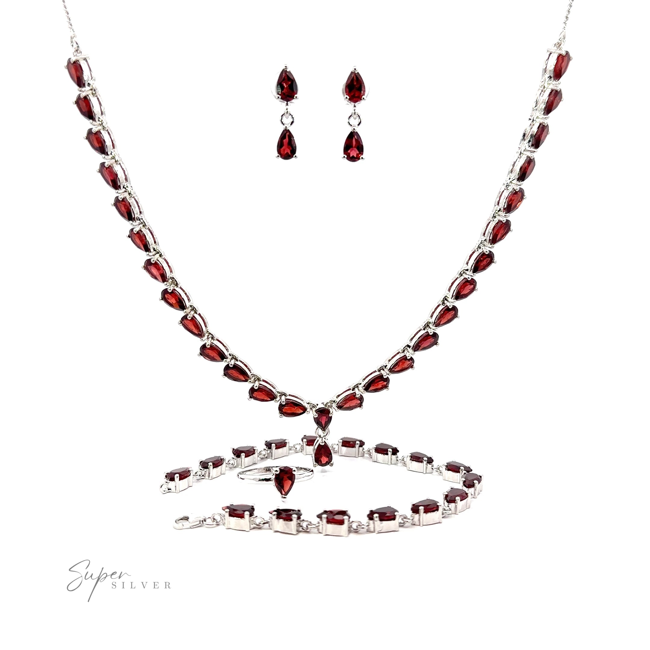 This Elegant Faceted Gemstone Jewelry Set showcases the timeless elegance of red garnet stones.