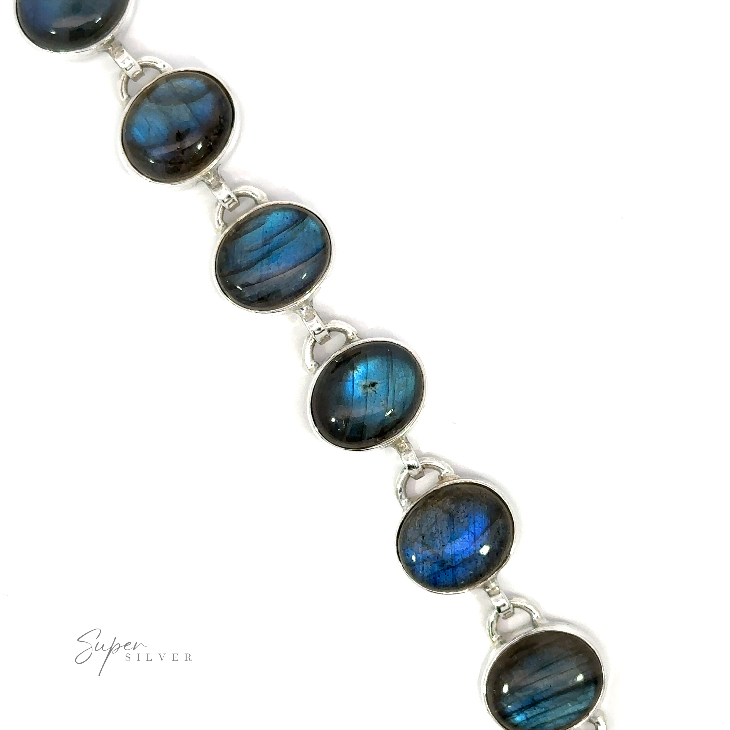 Statement Oval Gemstone Bracelet with oval labradorite stones showcasing blue iridescence, displayed on a white background.