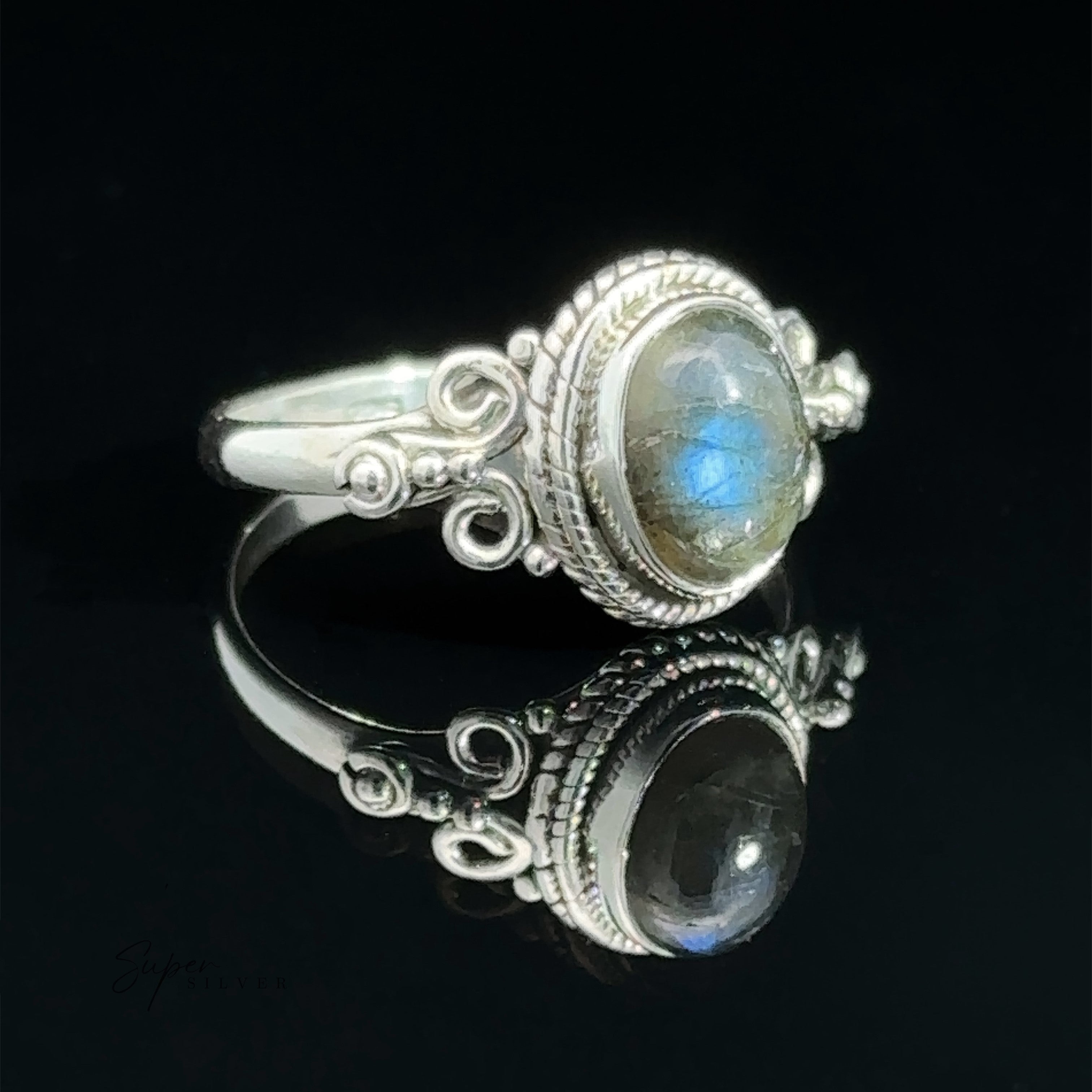 Natural Oval Moonstone Ring with Intricate Rope and Long Spiral Border