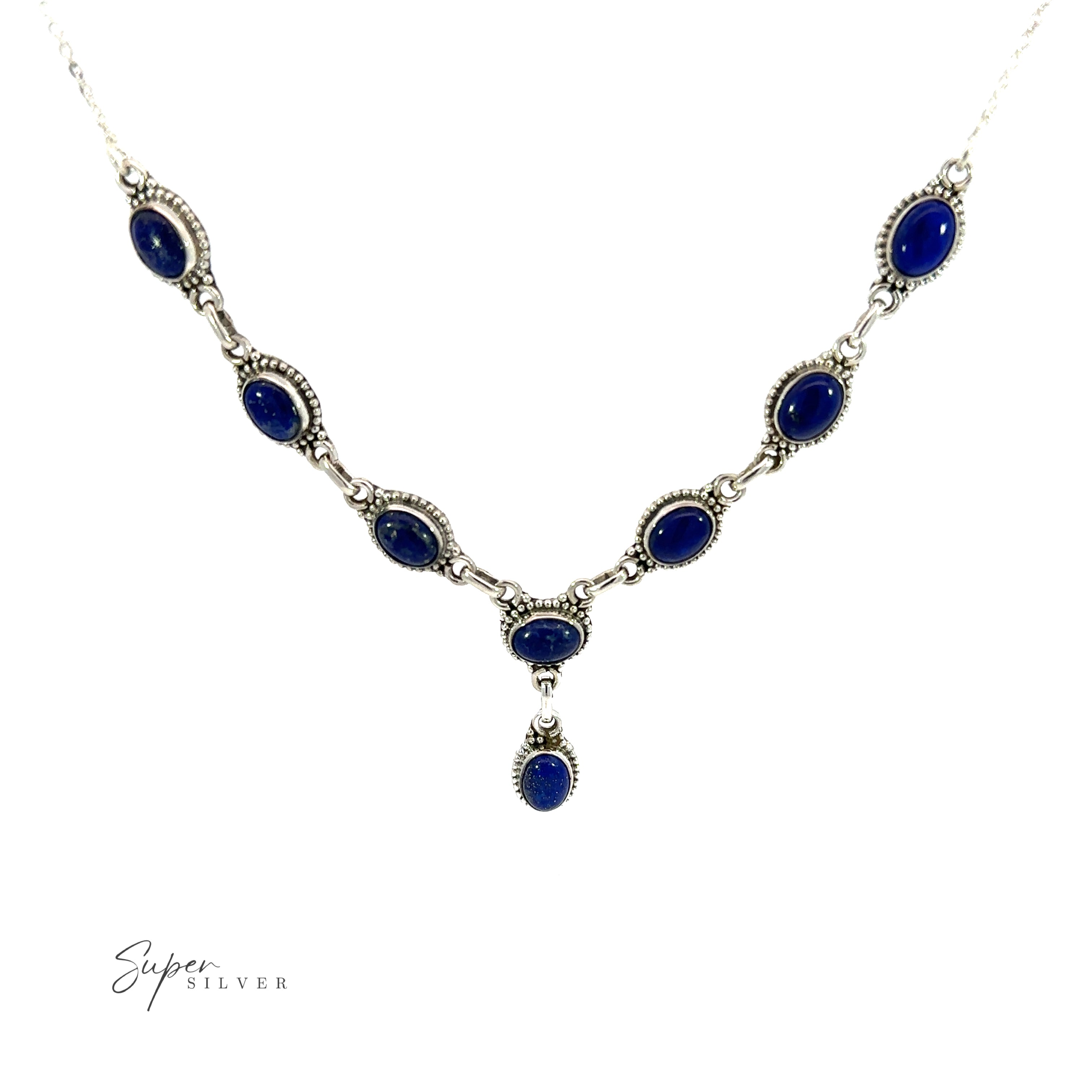 This Gemstone Y-Necklace with Beaded Border features a stunning Y-shaped design with lapis stones and a silver chain. Each gemstone is carefully selected for its vibrant color and natural beauty. The adjustable chain