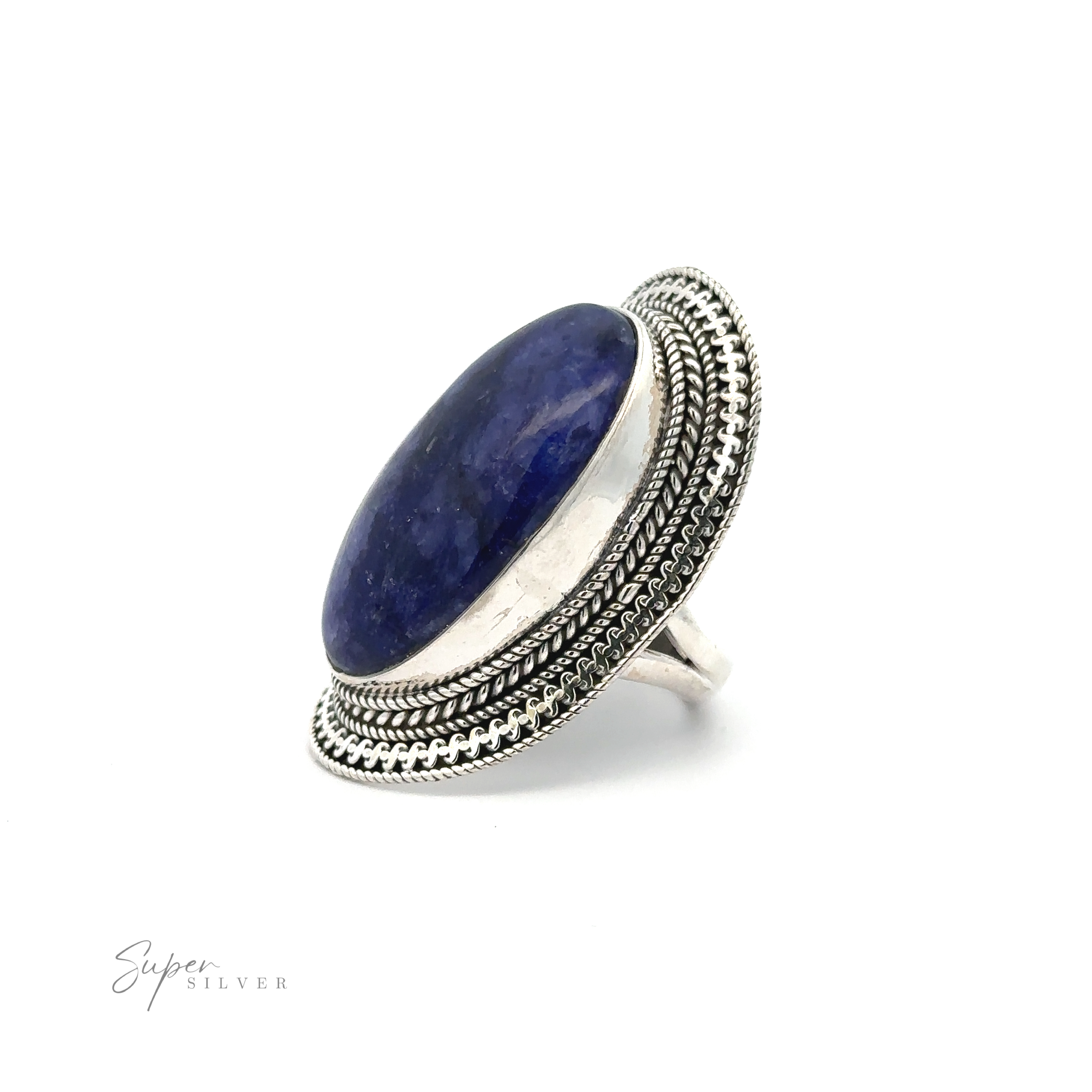 A Large Oval Shield Gemstone Ring in a bohemian flair adorns an intricately designed silver ring with detailed edges, labeled "Super Silver" in the corner.