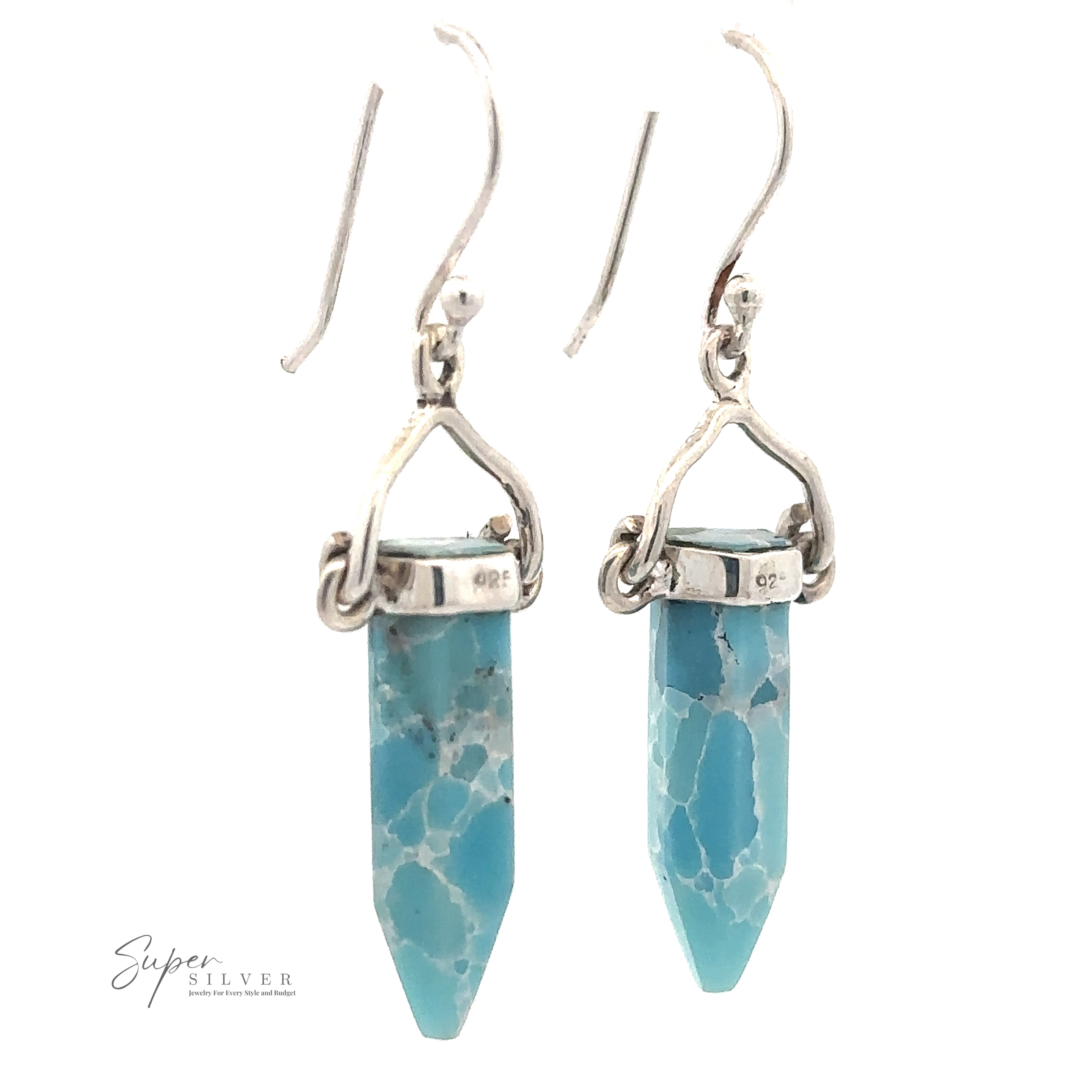 A pair of Obelisk Shape Raw Larimar Earrings with sterling silver French hooks and mountings. The gemstones are shaped into elongated hexagonal prisms.