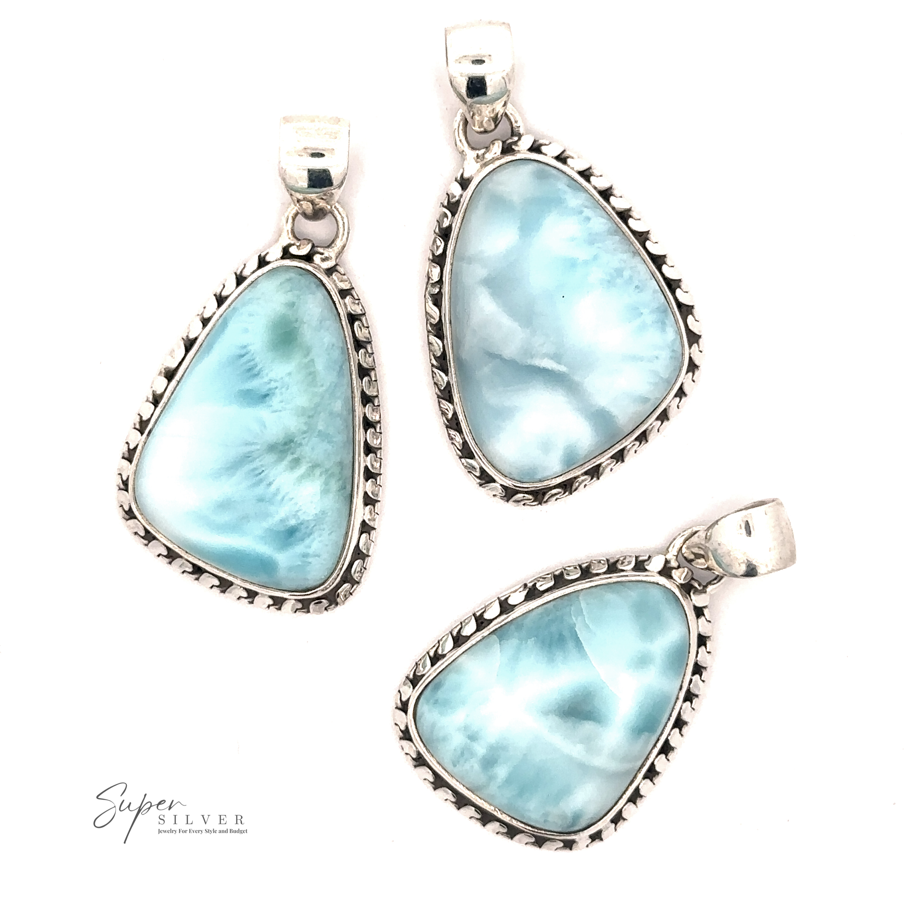 Three Larimar Pendants with Decorated Border featuring polished blue Larimar stones, each in a distinct triangular shape with beaded edge detailing, arranged on a white background. "Super Silver" logo visible in the corner. Chain not included.