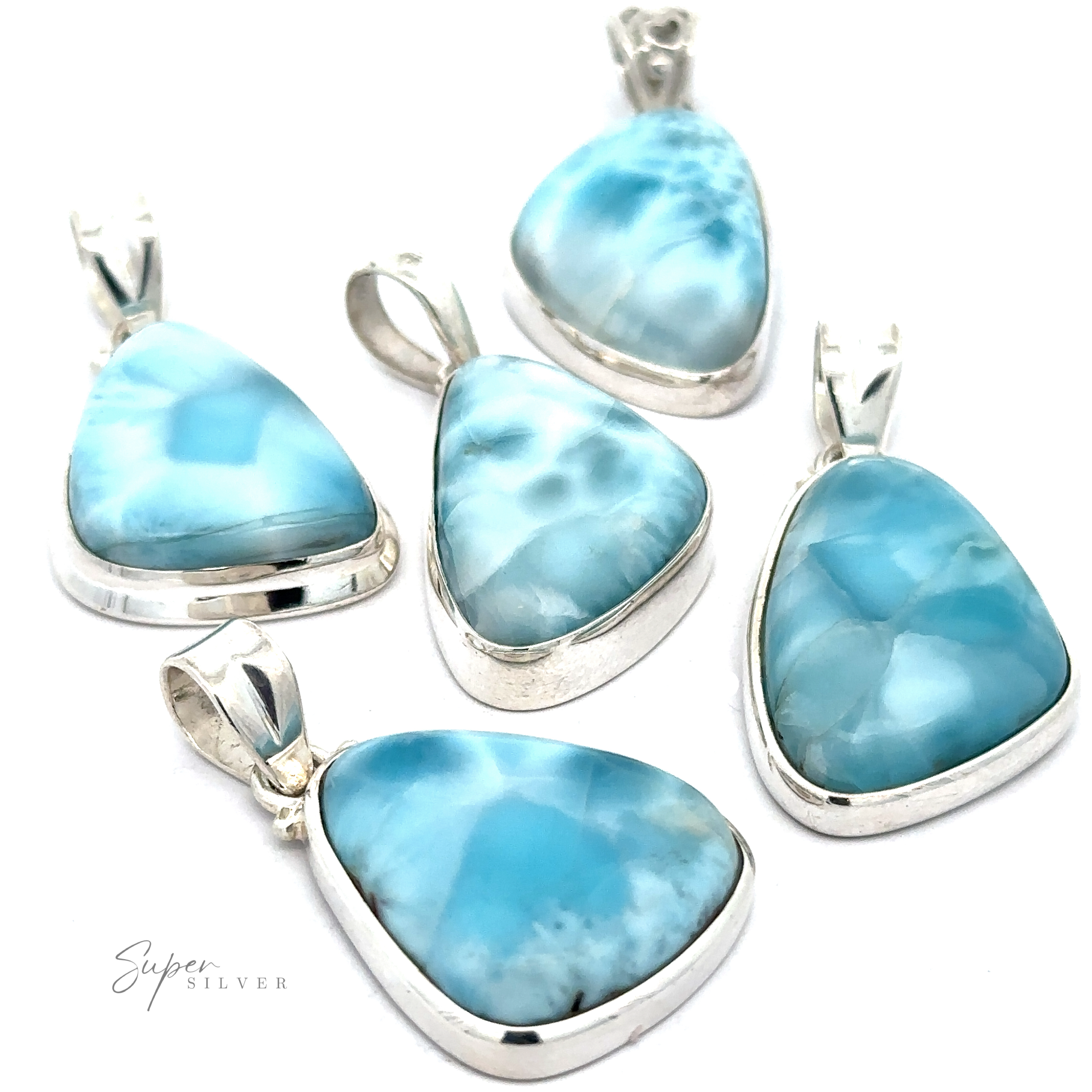 Five Freeform Shape Larimar Pendants featuring blue and white marbled Larimar stones arranged on a white background. "Super Silver" is written in cursive at the bottom left. Chain not included.