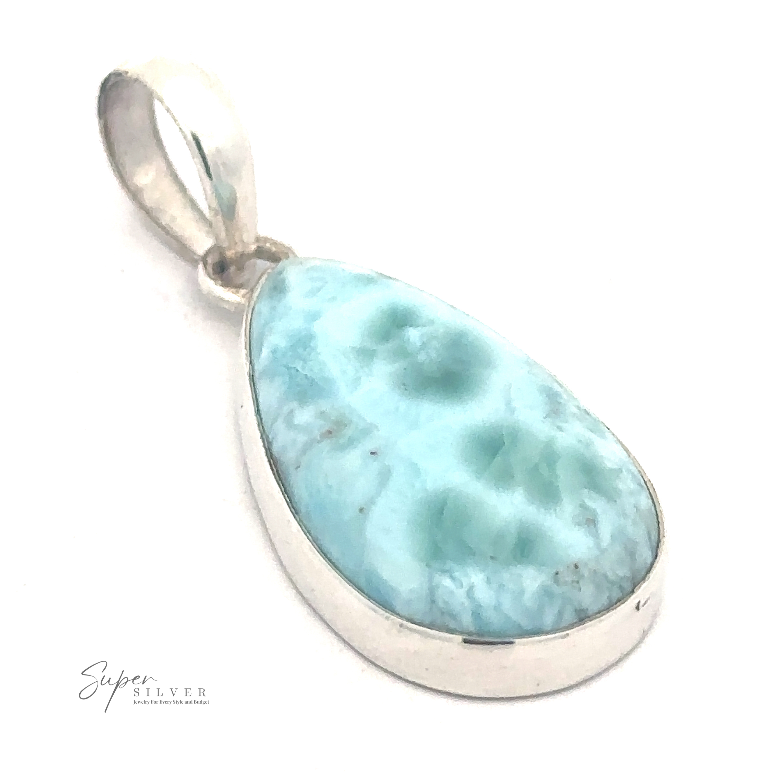 A Simple Larimar Teardrop Pendant with a polished blue gemstone set in a sterling silver frame and hanging from a silver loop. The logo "Super Silver" is visible in the bottom left corner.