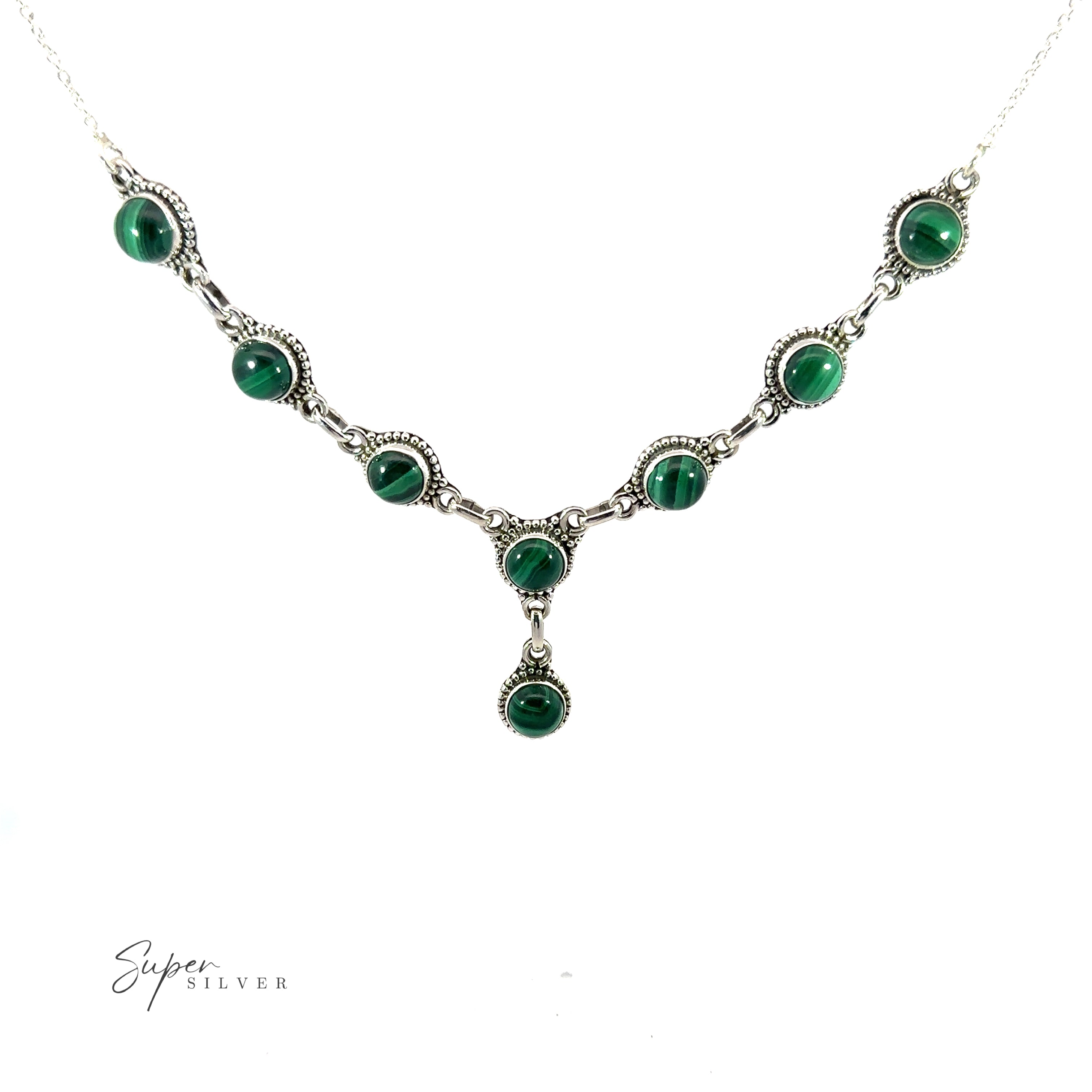 A Round Gemstone Y Necklace with Ball Border featuring nine circular green stones with a central stone hanging below the main chain. Perfect for those who love bohemian style jewelry, this piece adds a touch of elegance to any outfit. The background is white.