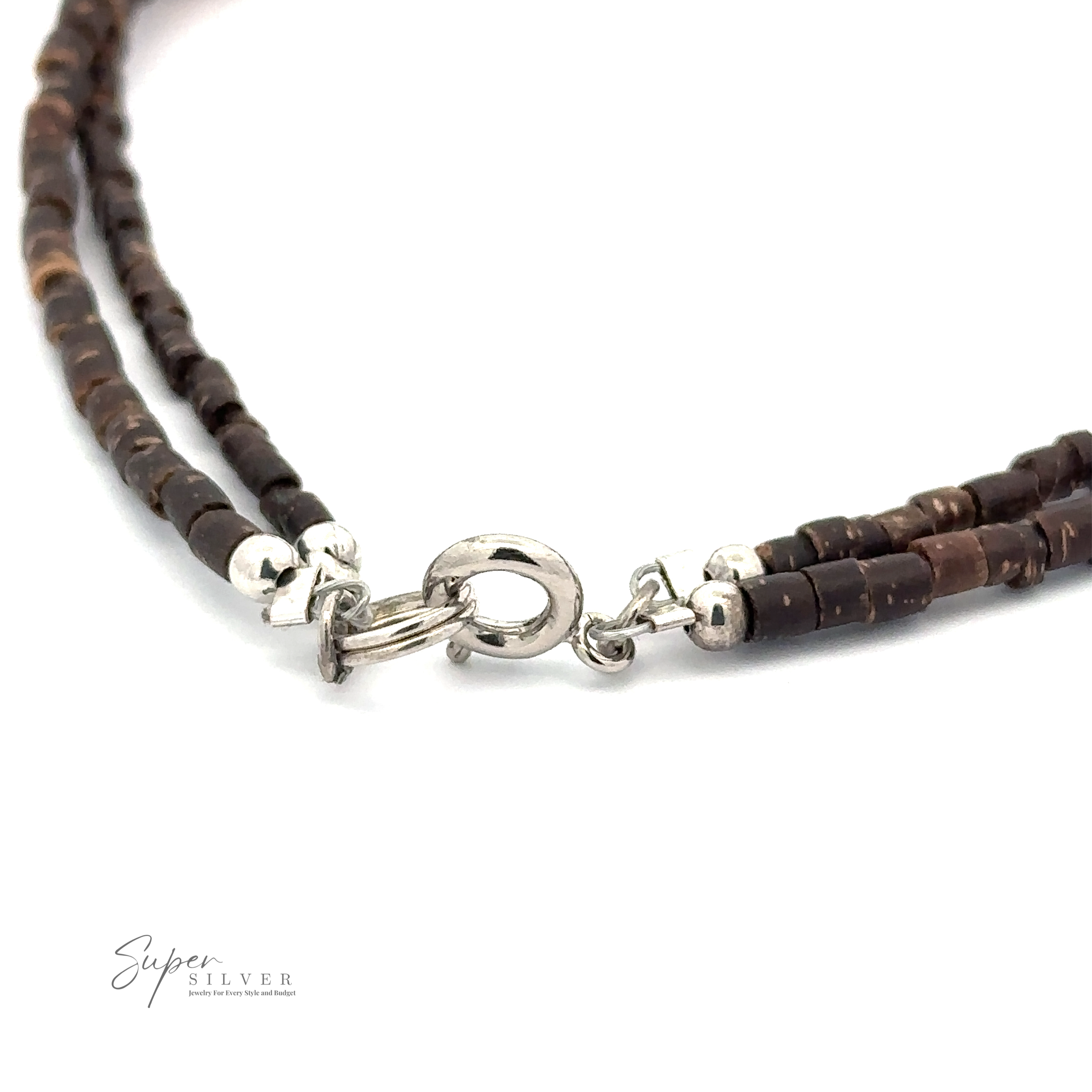 Close-up of a double-strand necklace made of dark brown beads with silver accents, featuring a silver clasp. The logo "Colorful Southwest Beaded Stone Anklet" is visible in the bottom left corner, reminiscent of the elegance found in their double beaded anklet collection.