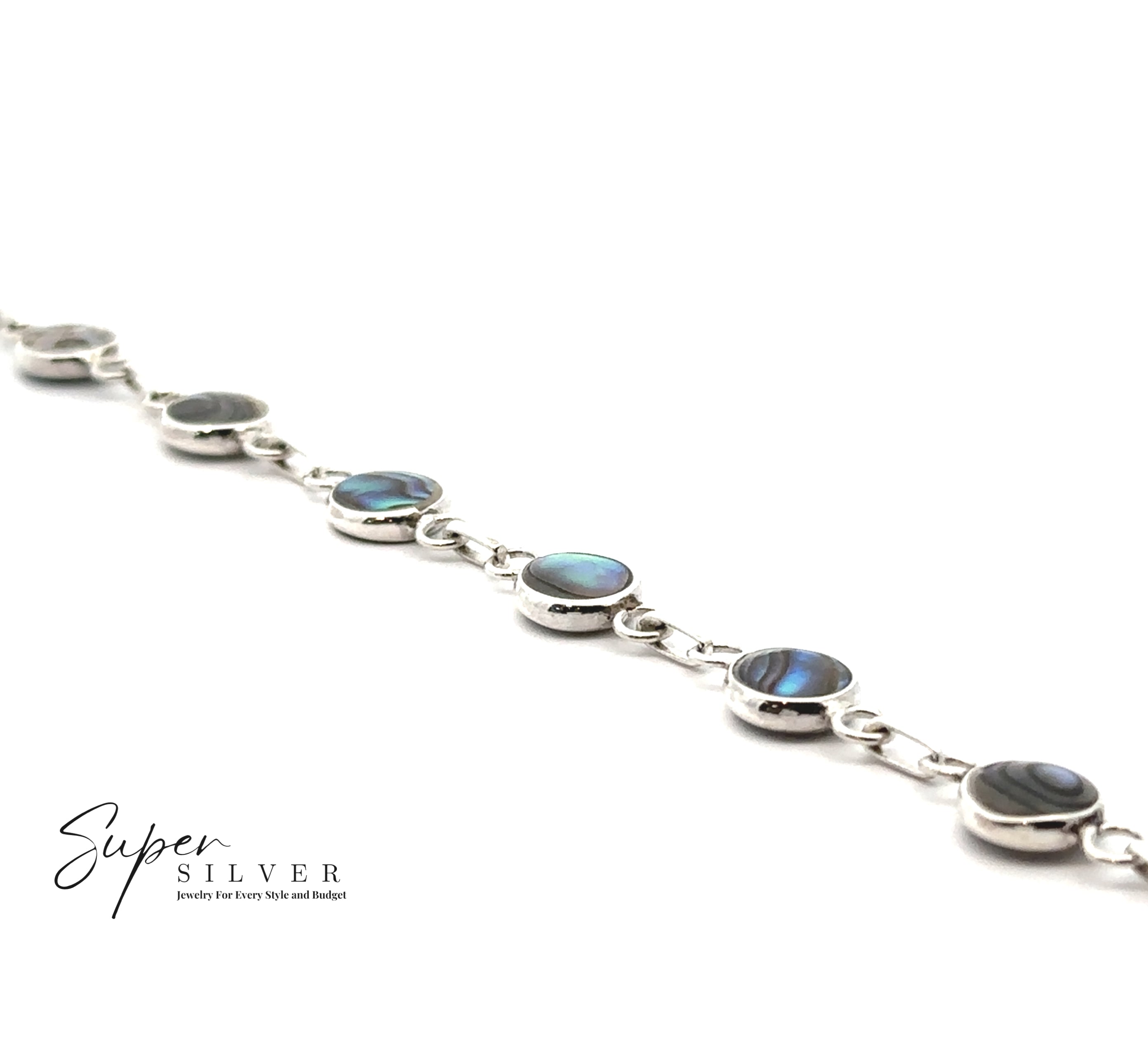 The Reversable Round Inlay Stone Bracelet with round iridescent Abalone stones is displayed on a white background, with the "Super Silver" brand visible in the bottom left corner.