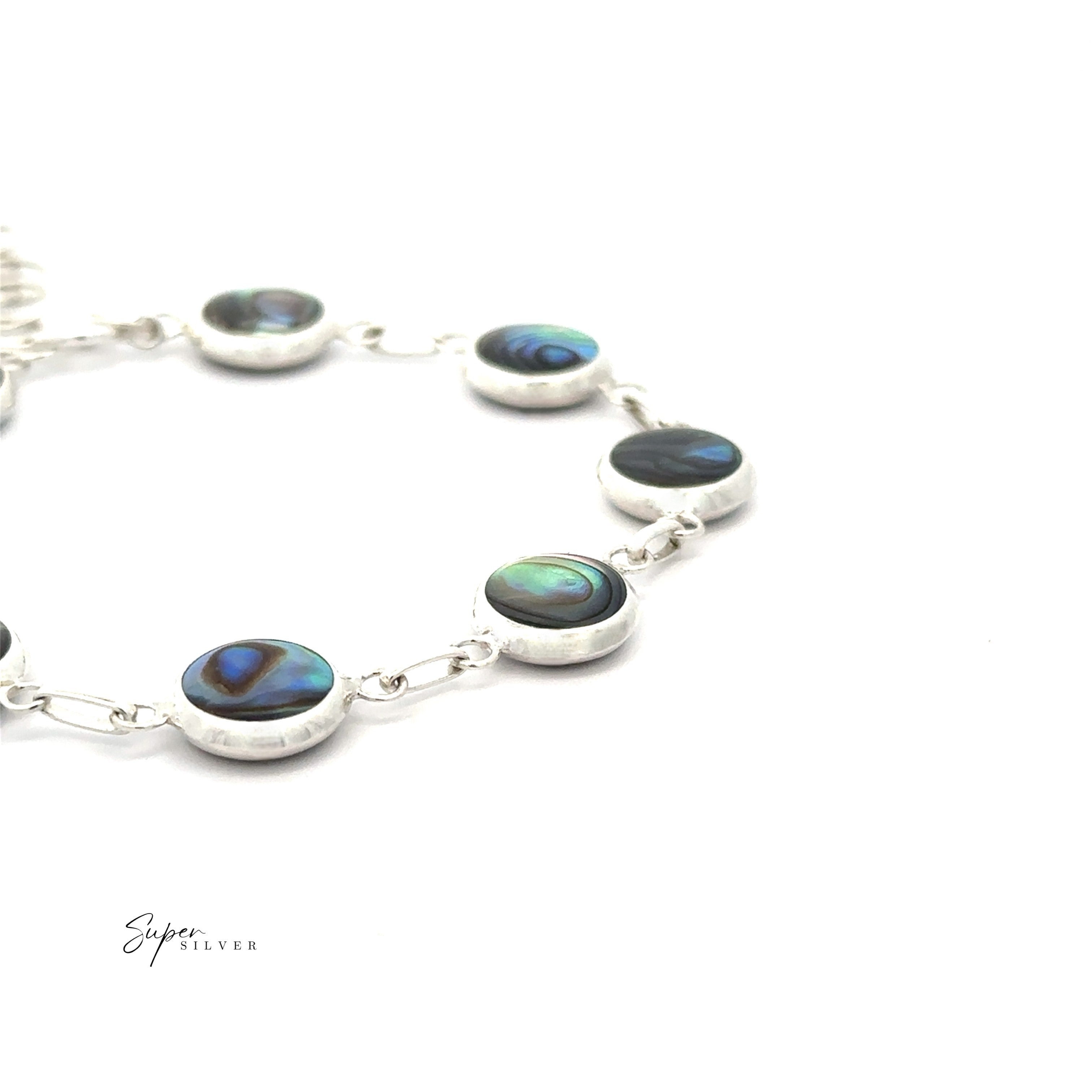 The Reversable Round Inlay Stone Bracelet, a silver bracelet with round abalone shell inlays, is shown on a white background with the "Super Silver" logo in the corner.