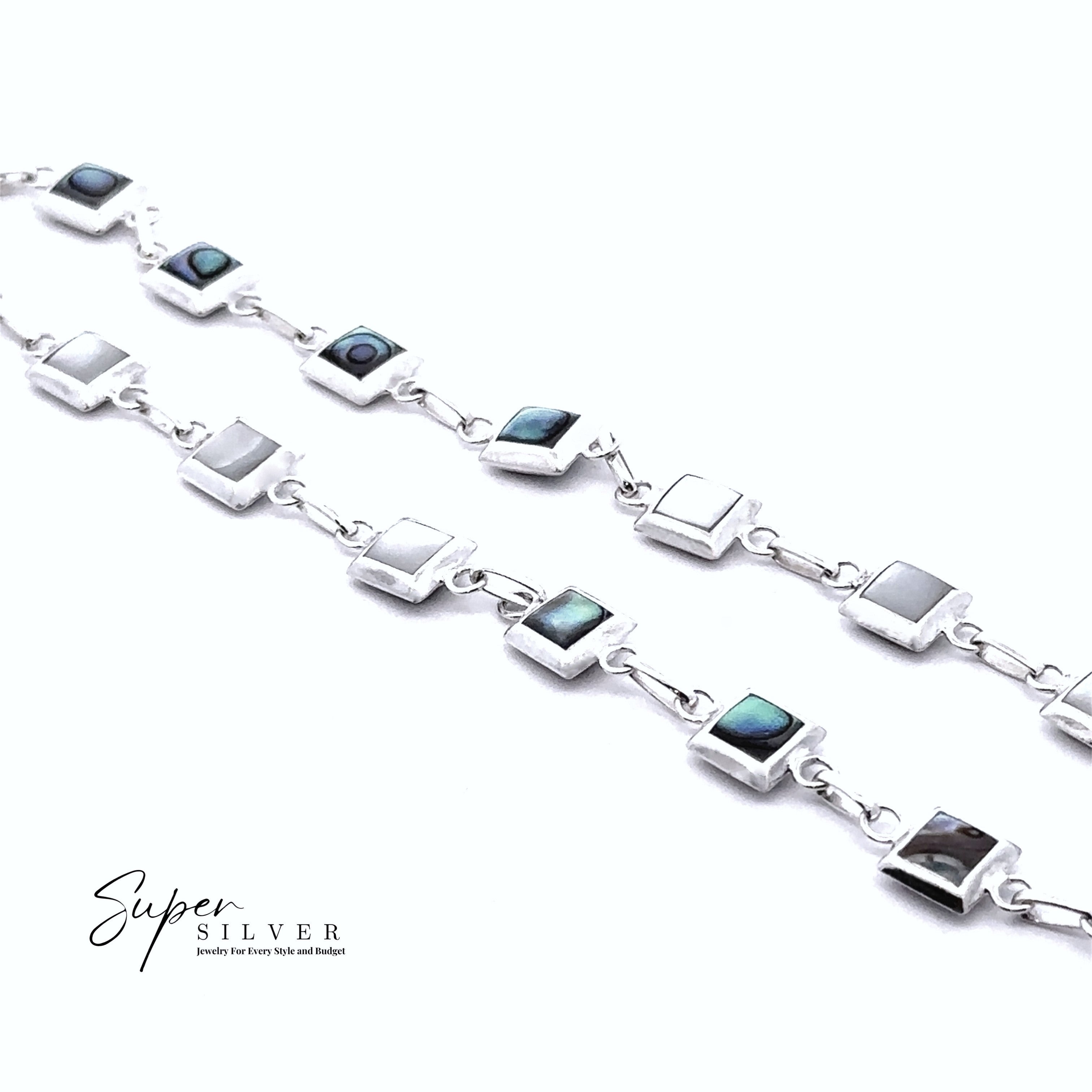 The Reversable Square Stone Inlay Bracelet features alternating square links with abalone and silver inlays, creating a stunning reversible design. Displayed on a white background with the "Super Silver" logo in the lower left corner.