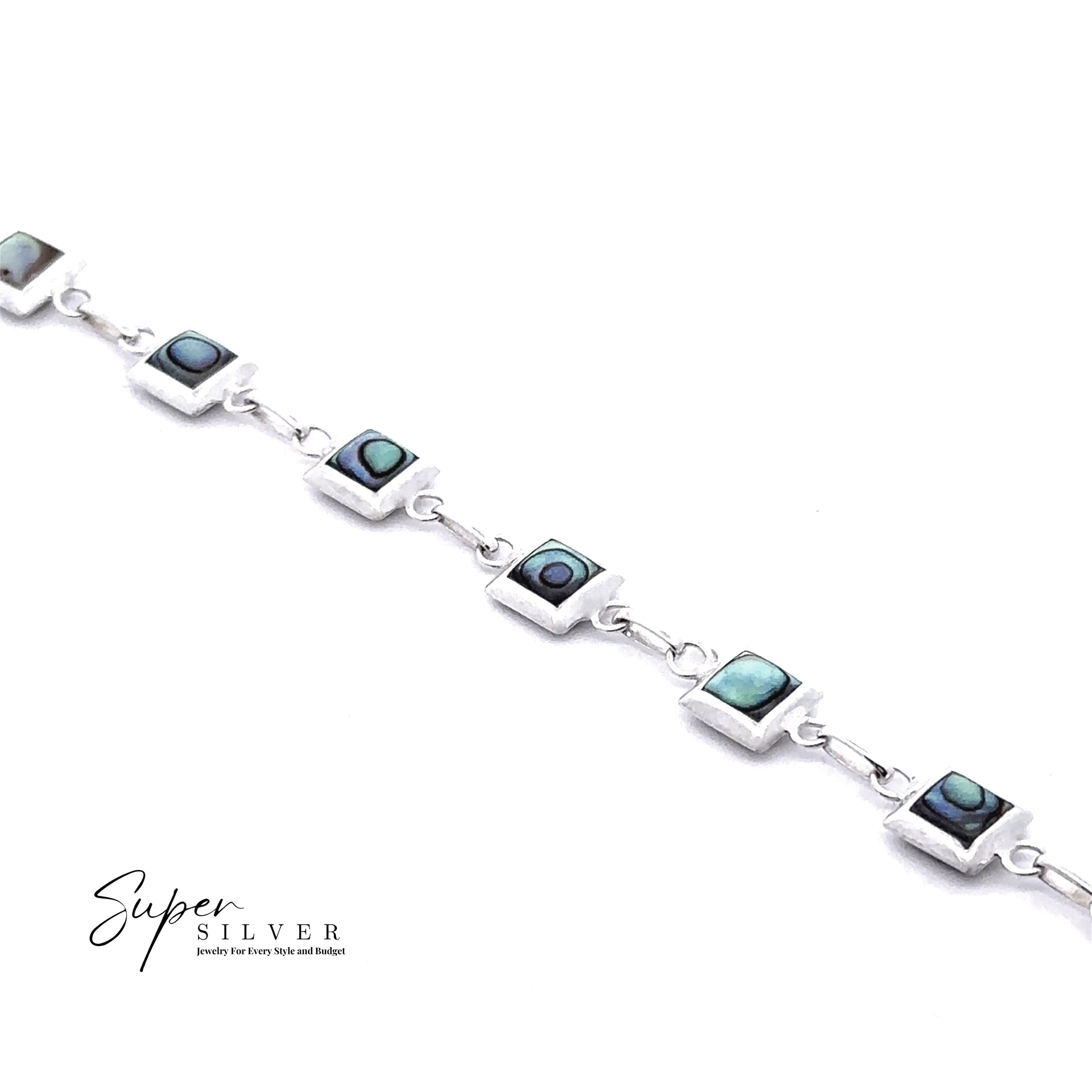 The Reversible Square Stone Inlay Bracelet, made of sterling silver with abalone shell inlays, is shown diagonally on a white background. "Super Silver" appears in the lower left corner.