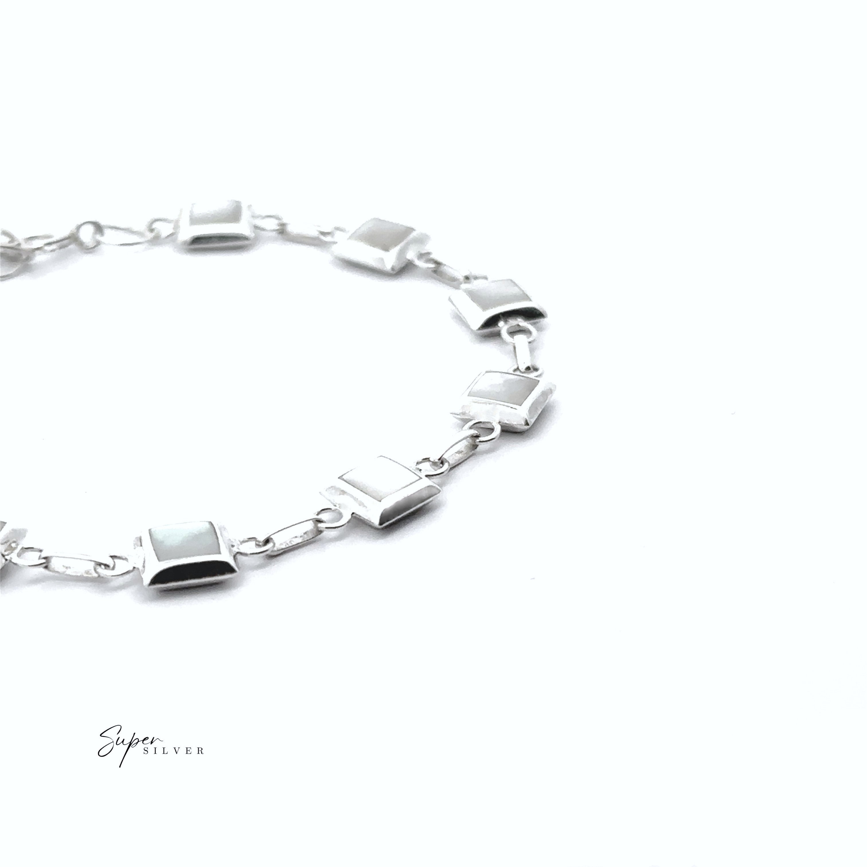 The Reversable Square Stone Inlay Bracelet, featuring silver square links and reversible inlay detail, is shown on a white background with "Super Silver" in the lower left corner.