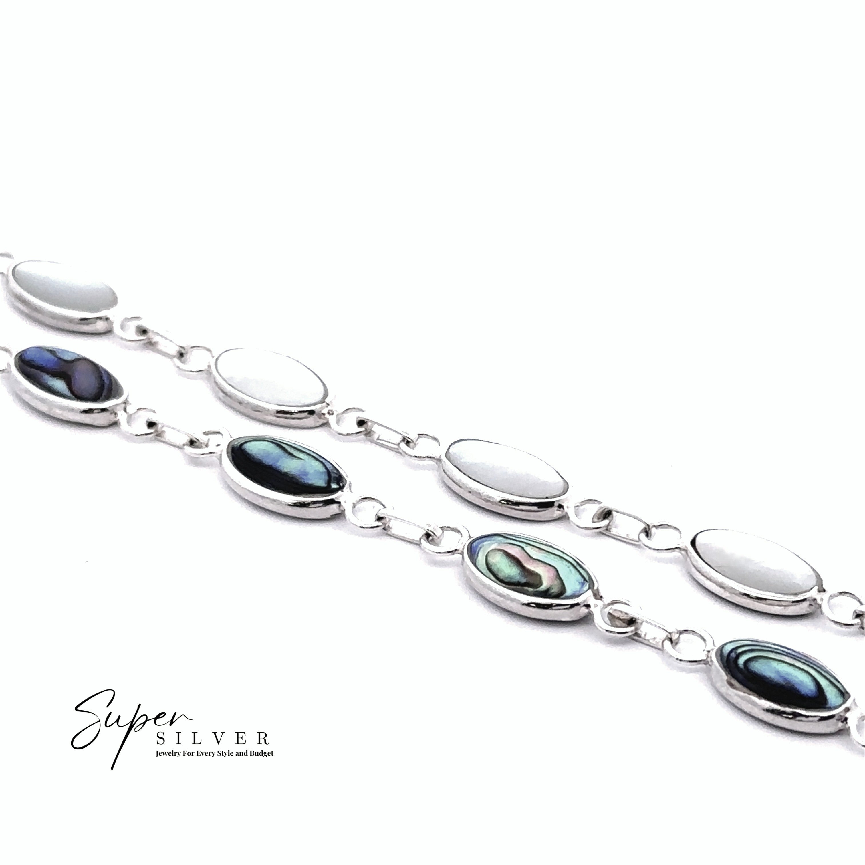 Two "Reversable Oval Shaped Inlay Stone Bracelets" with alternating oval links, some featuring abalone shell inlays. The design highlights subtle iridescence, with the "Super Silver" logo at the bottom left.