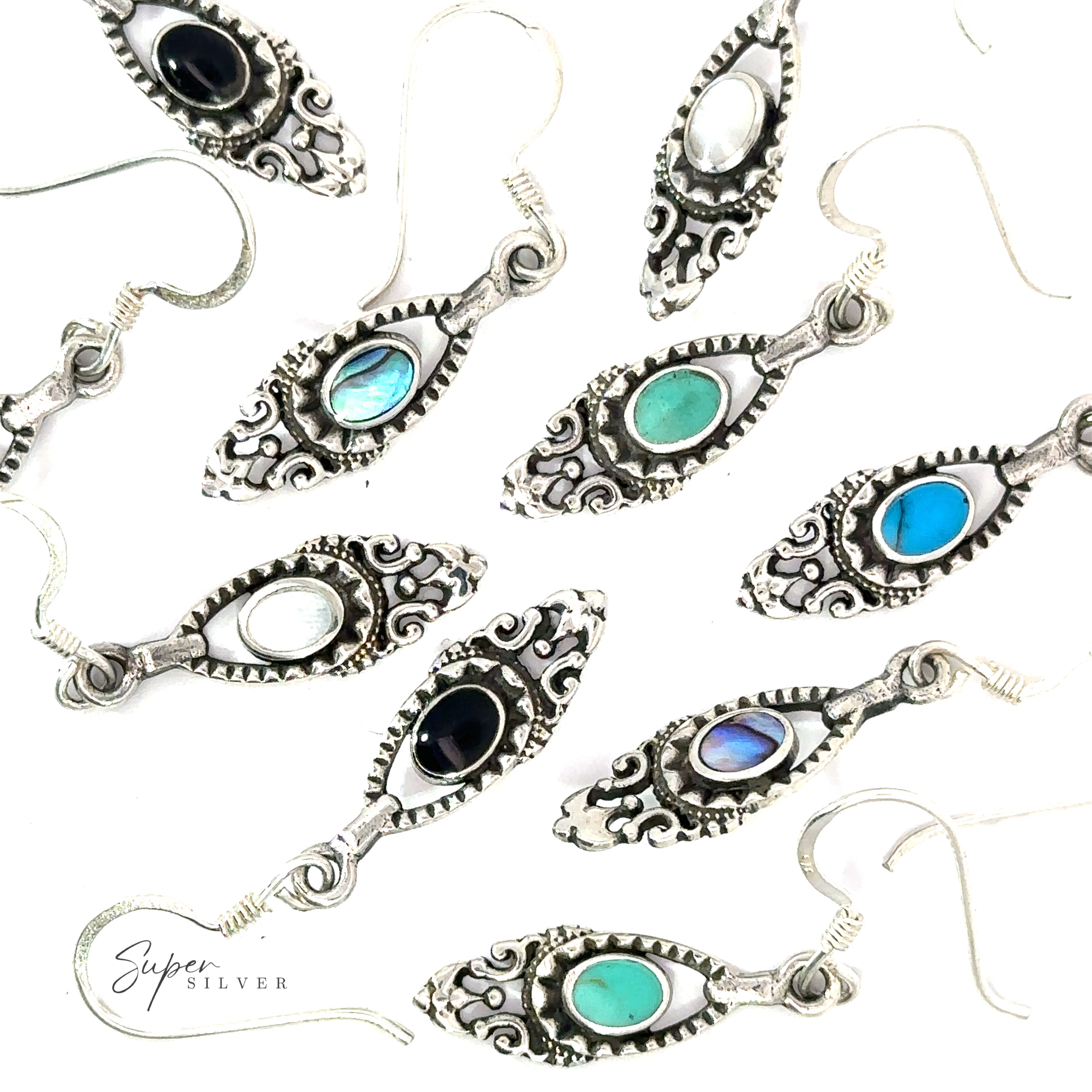 A group of Delicate Victorian Stone Earrings with blue and green stones.