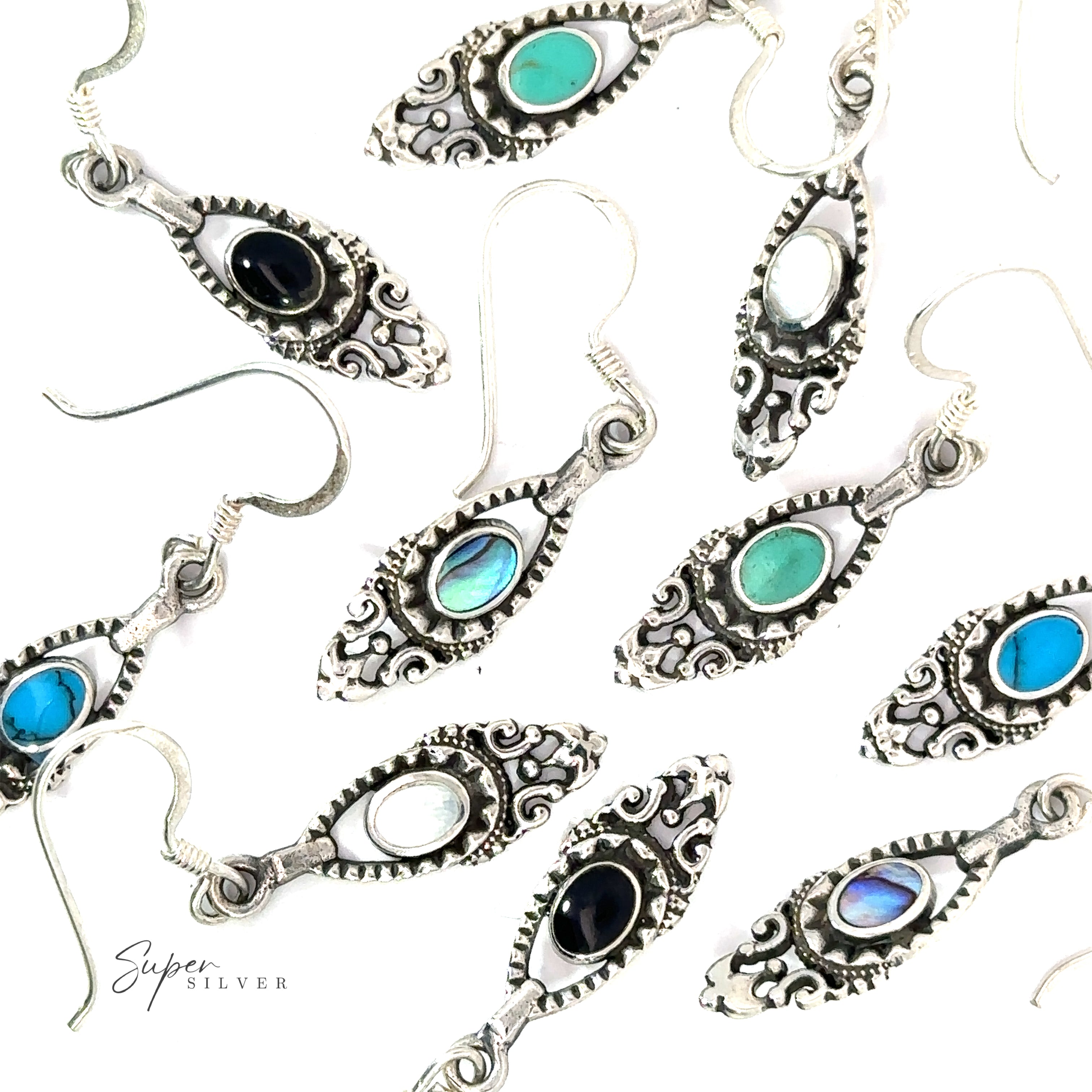 A group of small sterling silver Delicate Victorian Stone Earrings with turquoise stones.