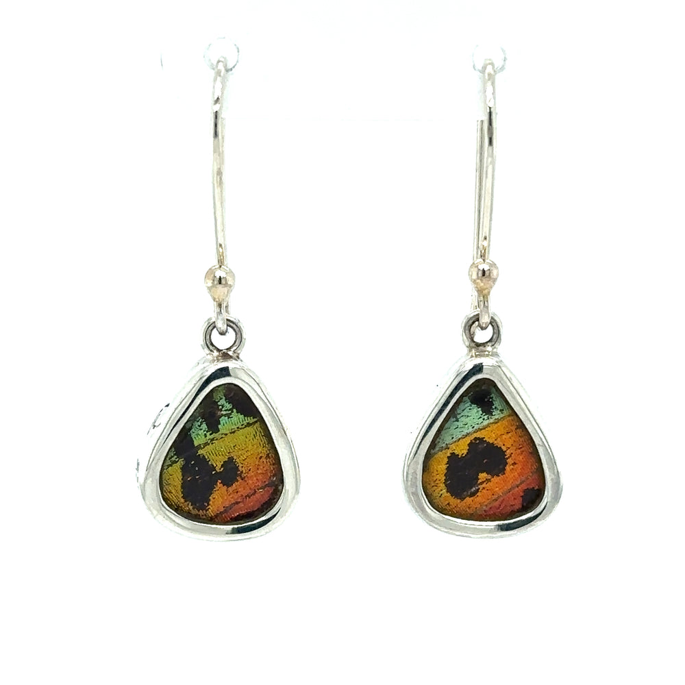 
                  
                    A pair of Small Wide Teardrop Butterfly Wing Earrings that make a statement.
                  
                