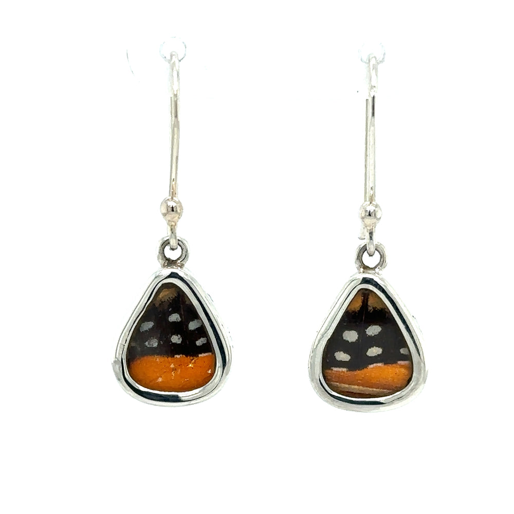 
                  
                    A pair of Small Wide Teardrop Butterfly Wing Earrings with orange and black stripes, perfect for a boho vibe.
                  
                