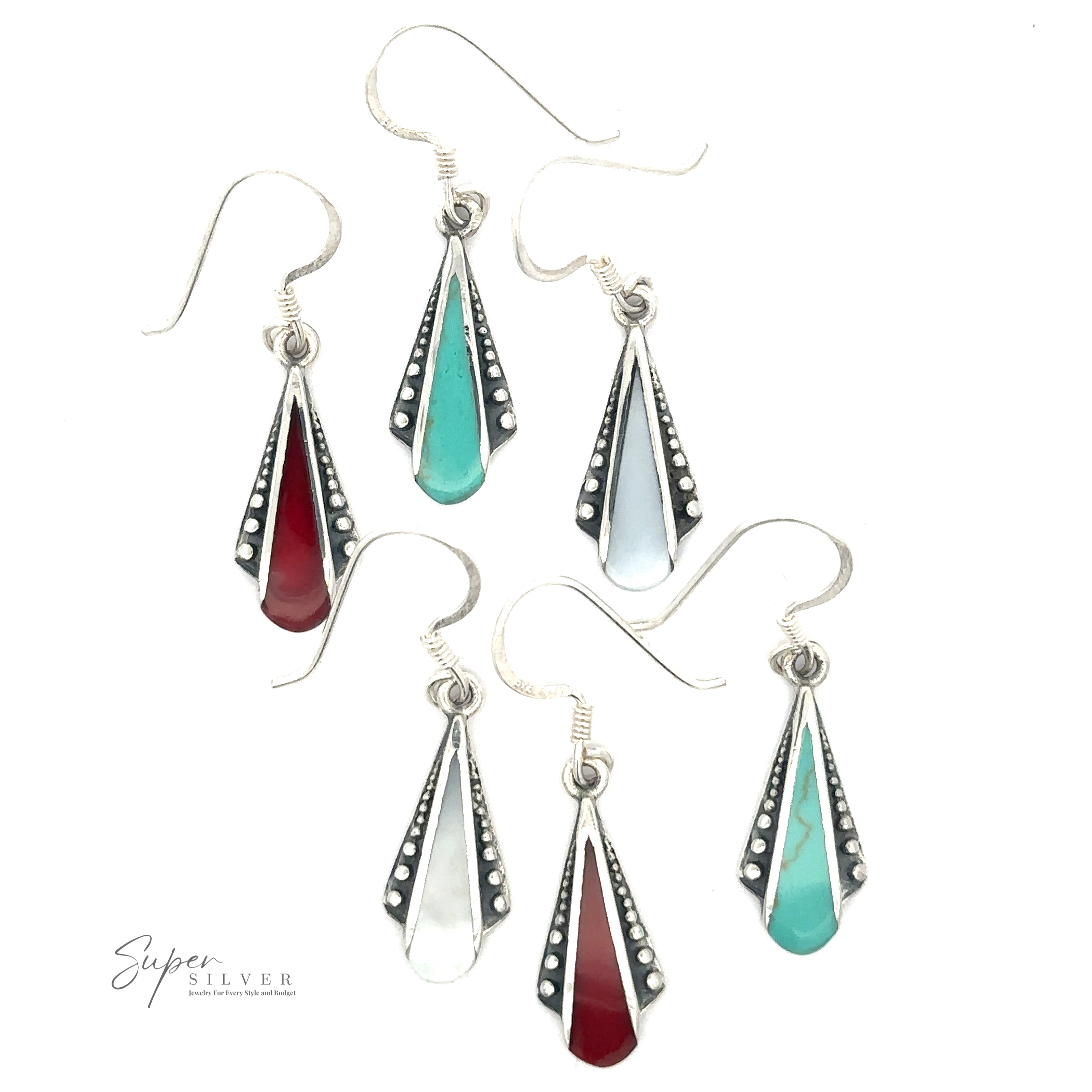 Three pairs of Inlaid Teardrop Shaped Bali Inspired Earrings with hook fastenings. Each pair features teardrop-shaped stones in red, turquoise, and white, set in sterling silver with decorative accents. These stunning earrings offer a touch of exotic elegance to any outfit.