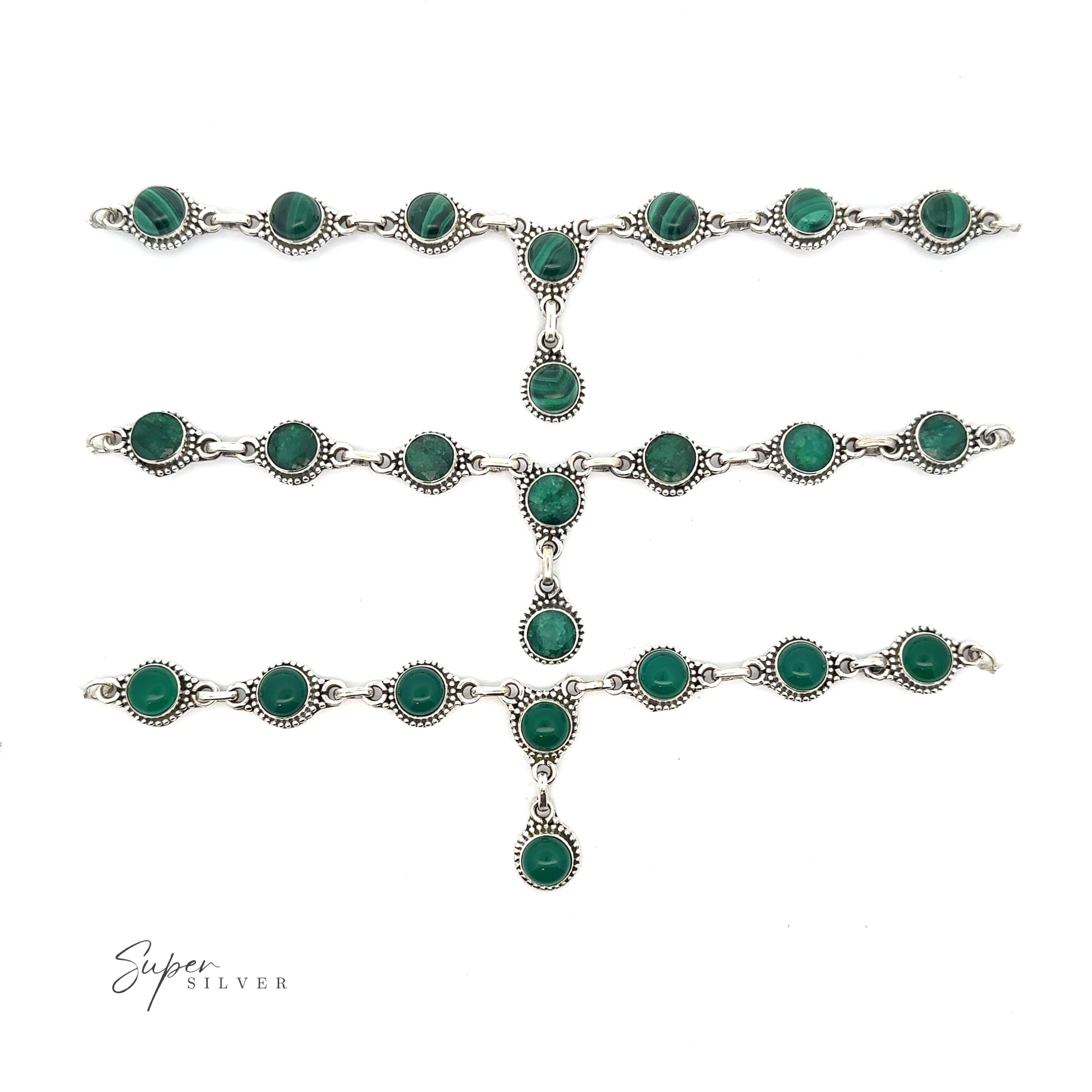 A Round Gemstone Y Necklace with Ball Border laid out in a row on a white background, exuding bohemian style jewelry charm, with "Super Silver" written in the bottom left corner.