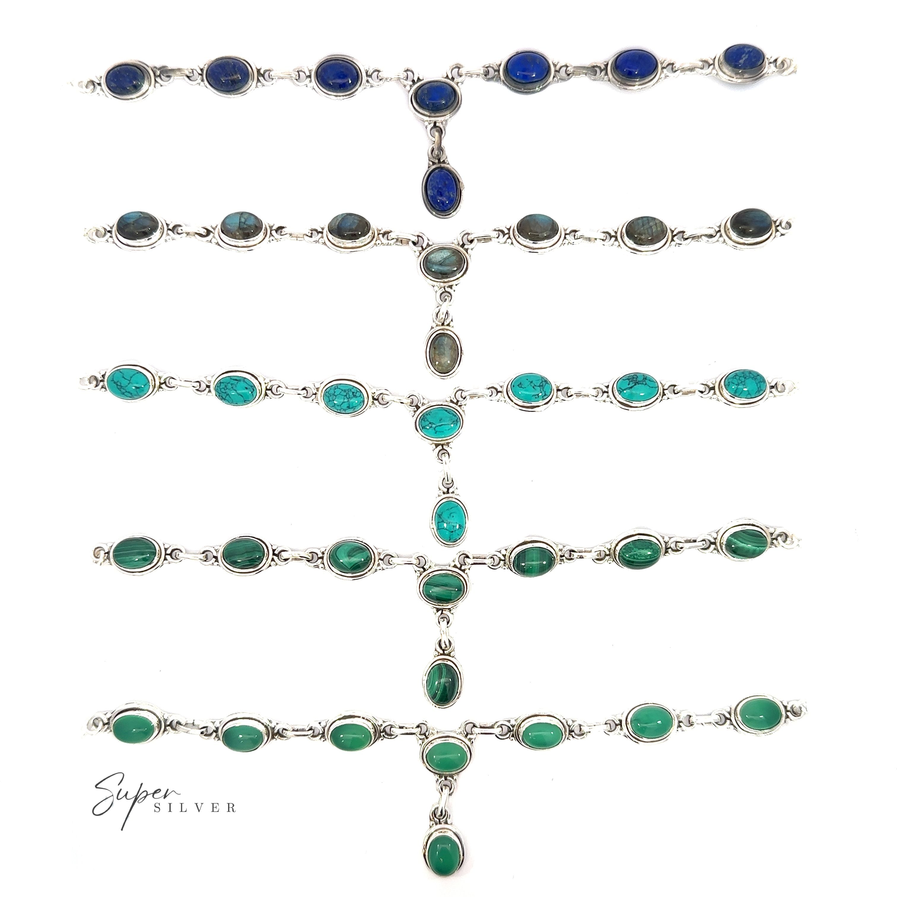 Seven Simple Oval Y Necklaces with green, blue, and turquoise gemstones, exuding a bohemian charm, arranged in a vertical row on a white background. The text "Super Silver" appears in the bottom left corner.