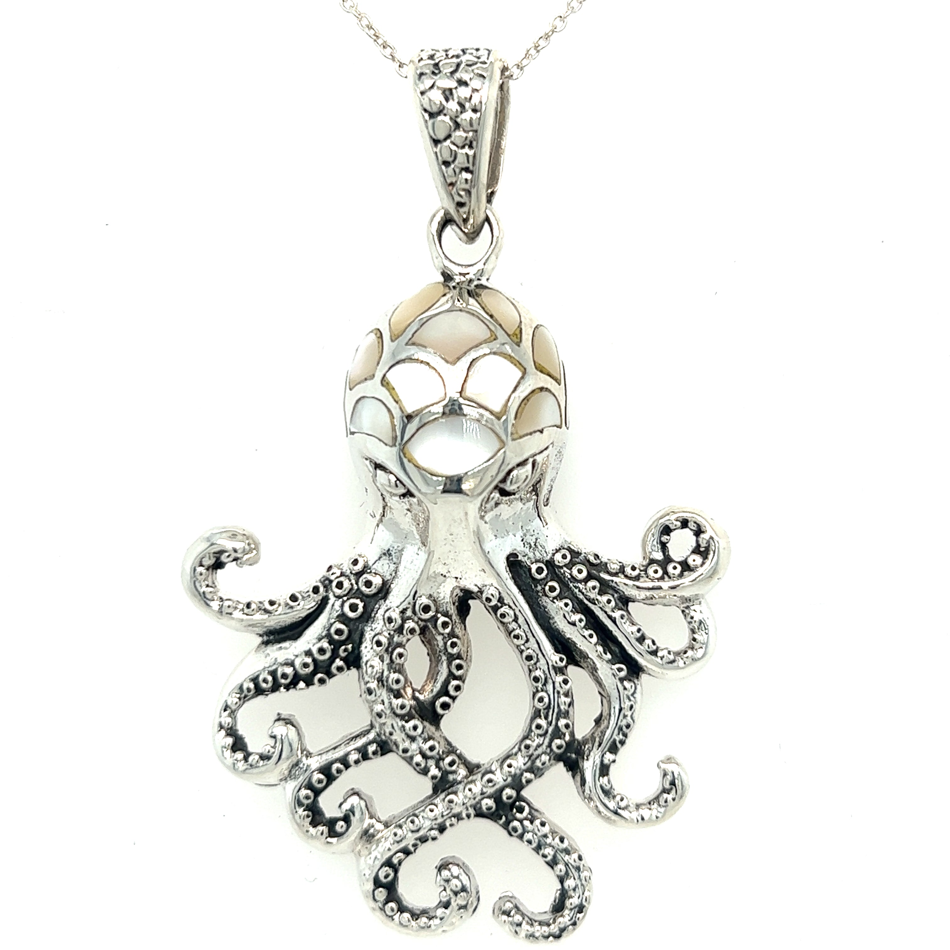 A Super Silver Statement Octopus Pendant adorned with inlay stone details on a silver chain.