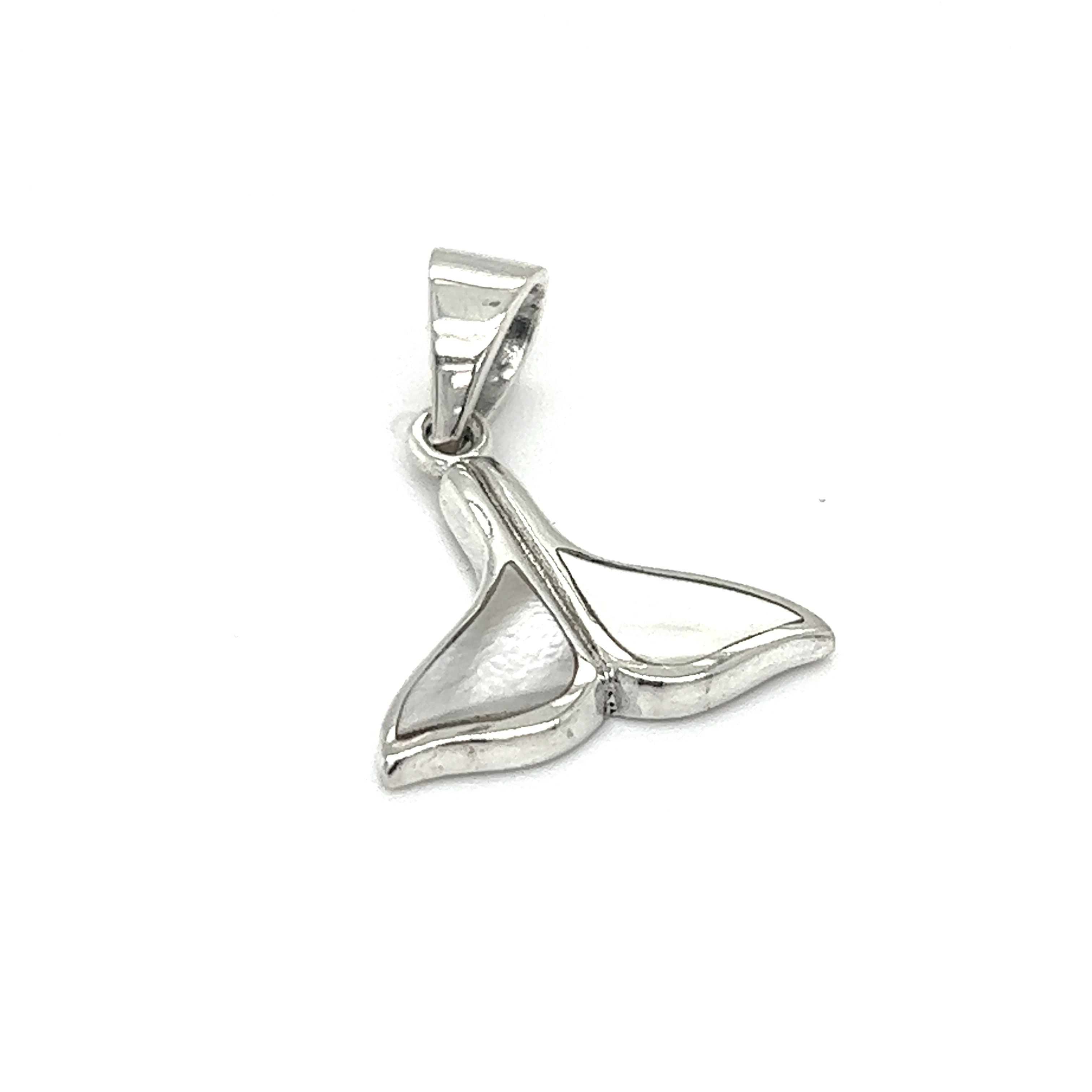 A Simple Whale Tail Pendant with Inlay Stones from Super Silver on a white background, symbolizing ocean conservation.