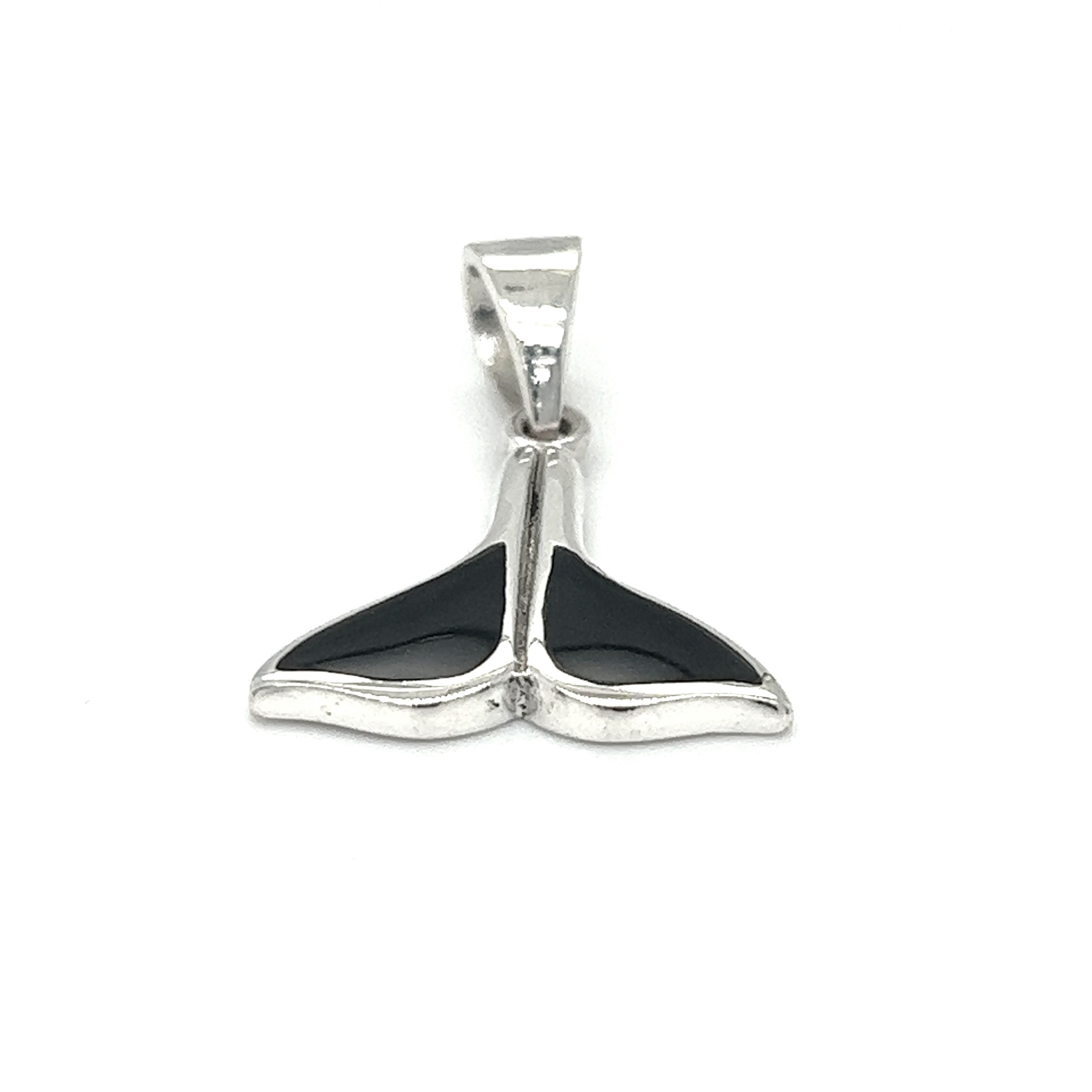 A Simple Whale Tail Pendant with Inlay Stones by Super Silver on a white background.