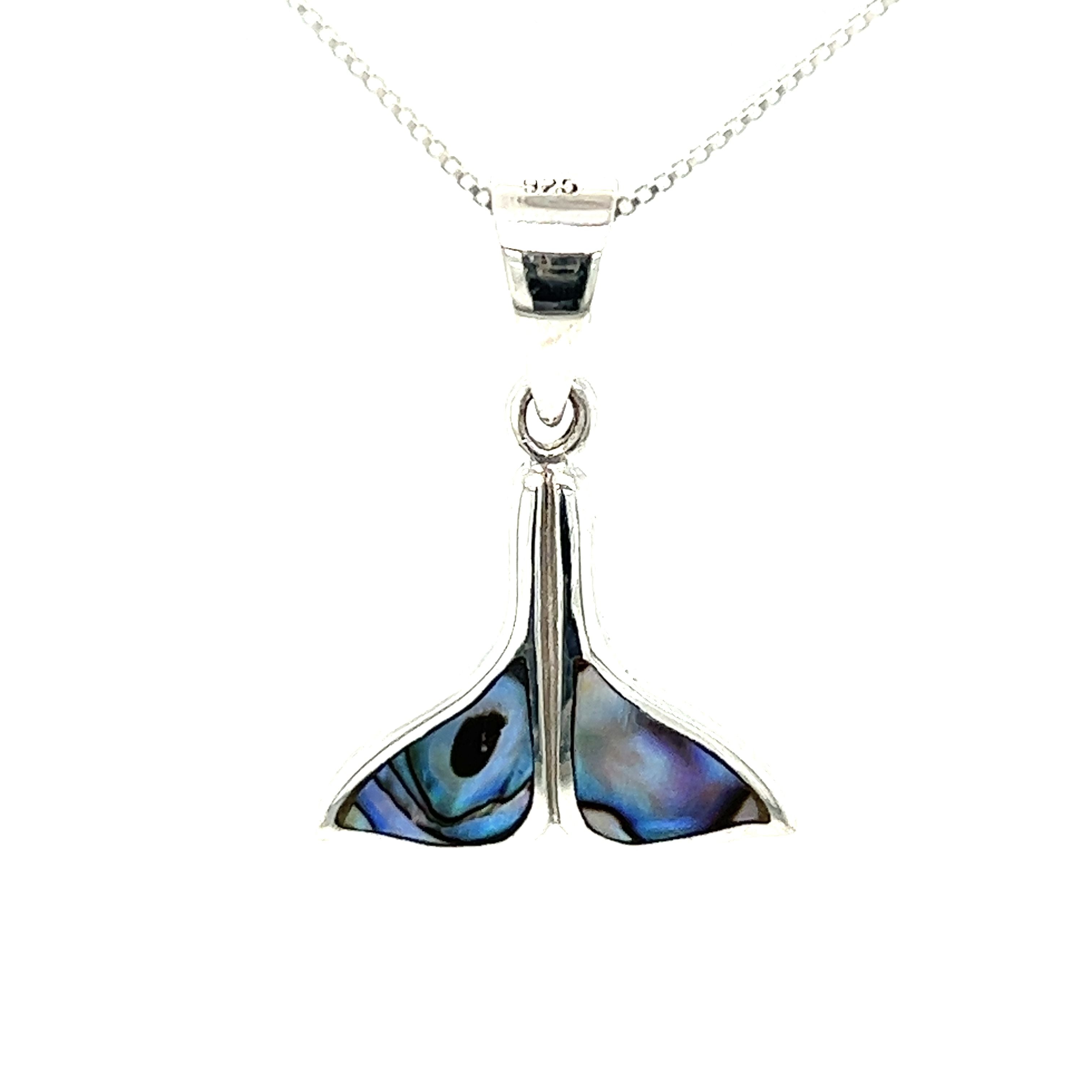 An abalone Simple Whale Tail Pendant with Inlay Stones on a Super Silver sterling silver chain, inspired by the beauty of the ocean.