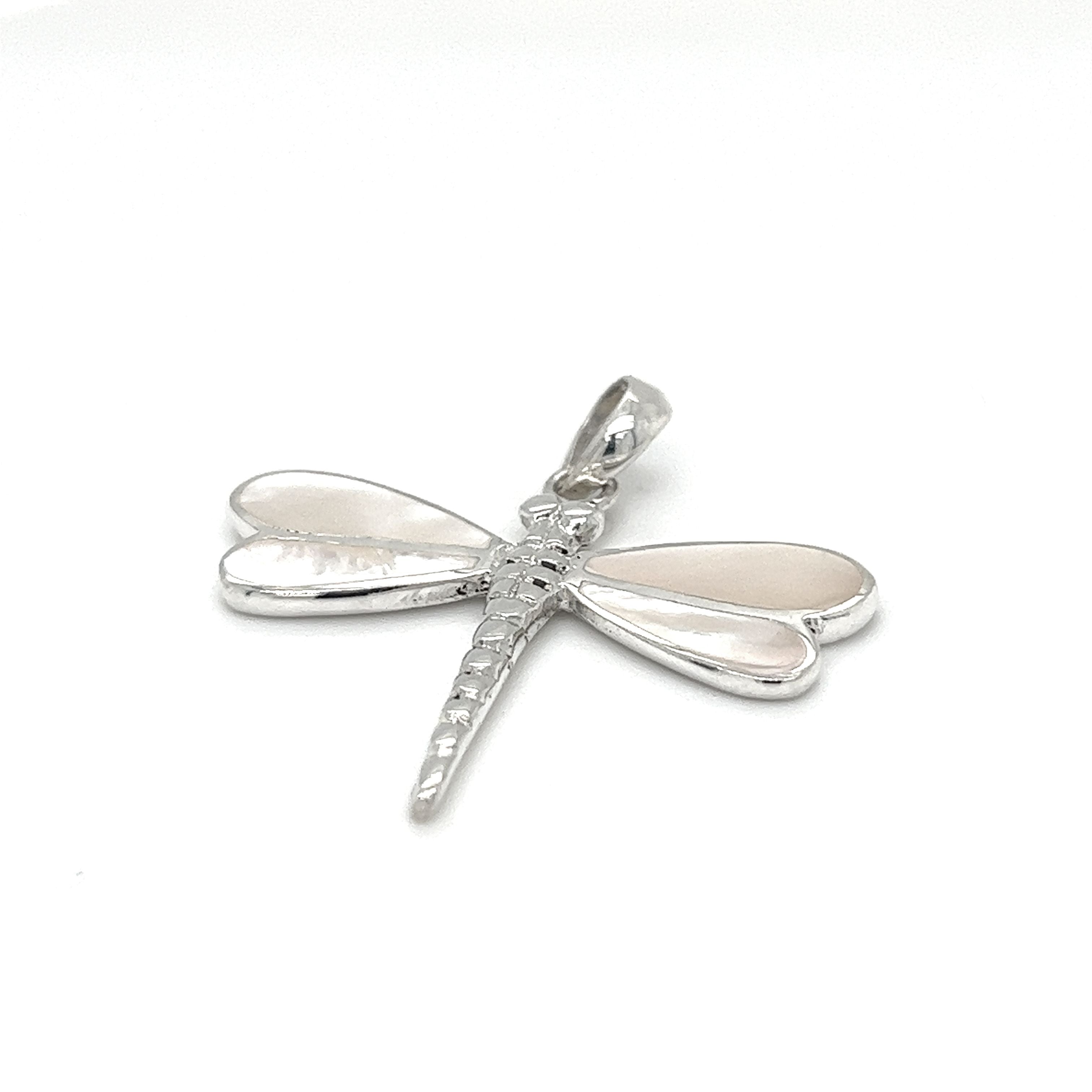 A Super Silver Dragonfly Inlay Stone Pendant featuring abalone on a white background.