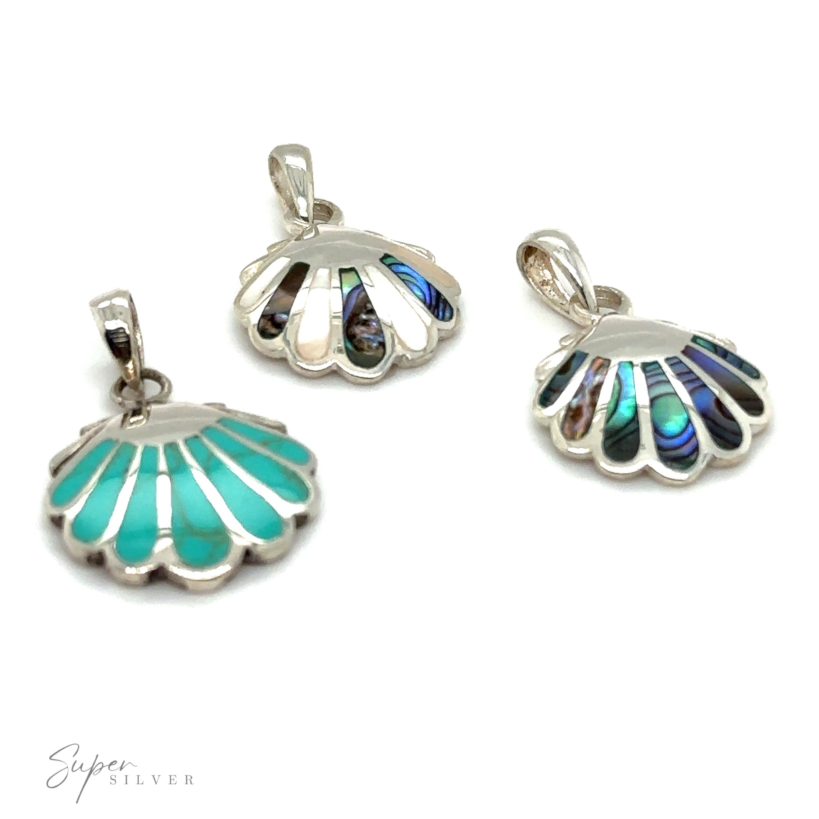 Three Clam Shell Pendants on a white background.