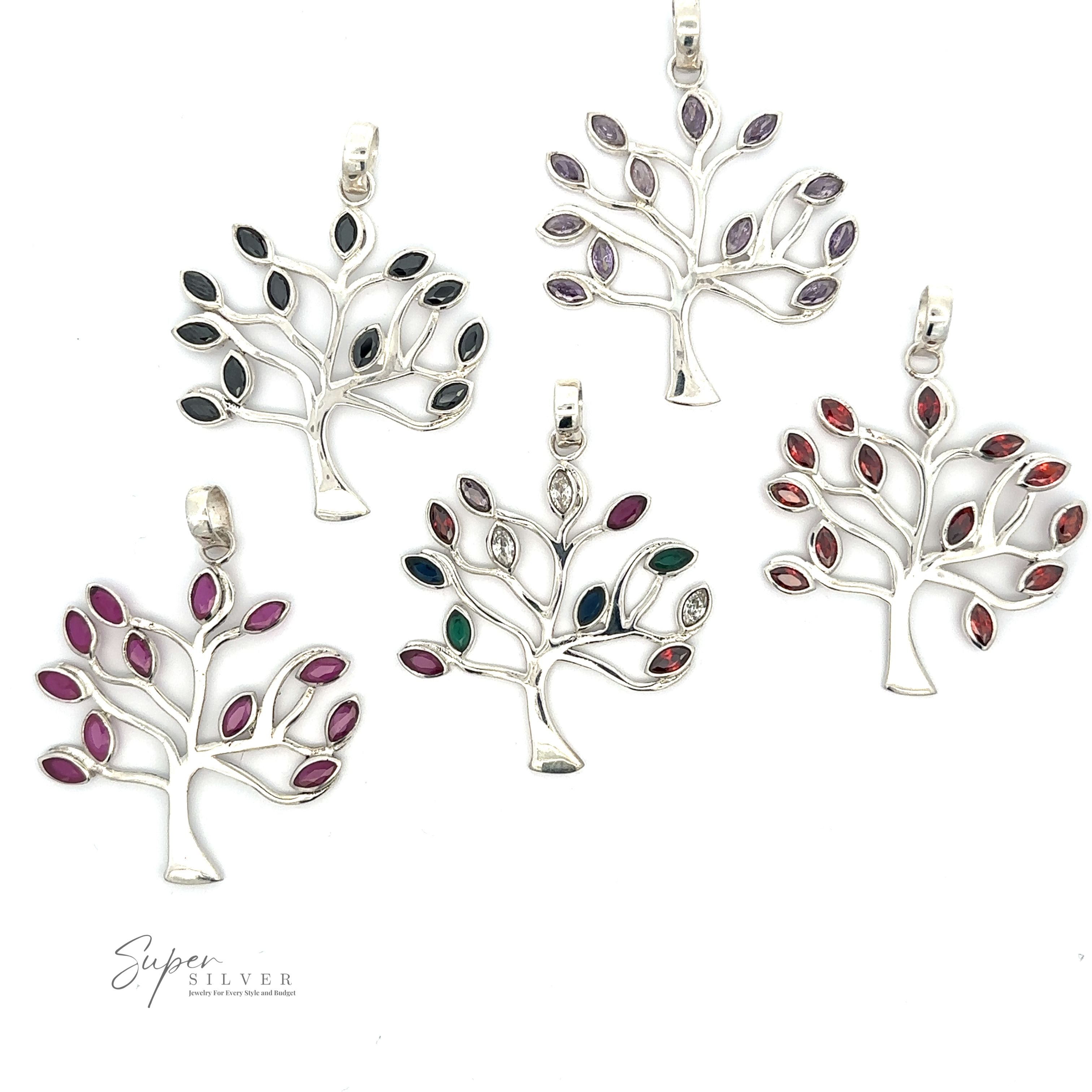 Five Tree of Life Pendant with Stone Leaves pendants with multi-colored faceted stone leaves are arranged on a white background. A logo in the bottom left corner reads "Super Silver.