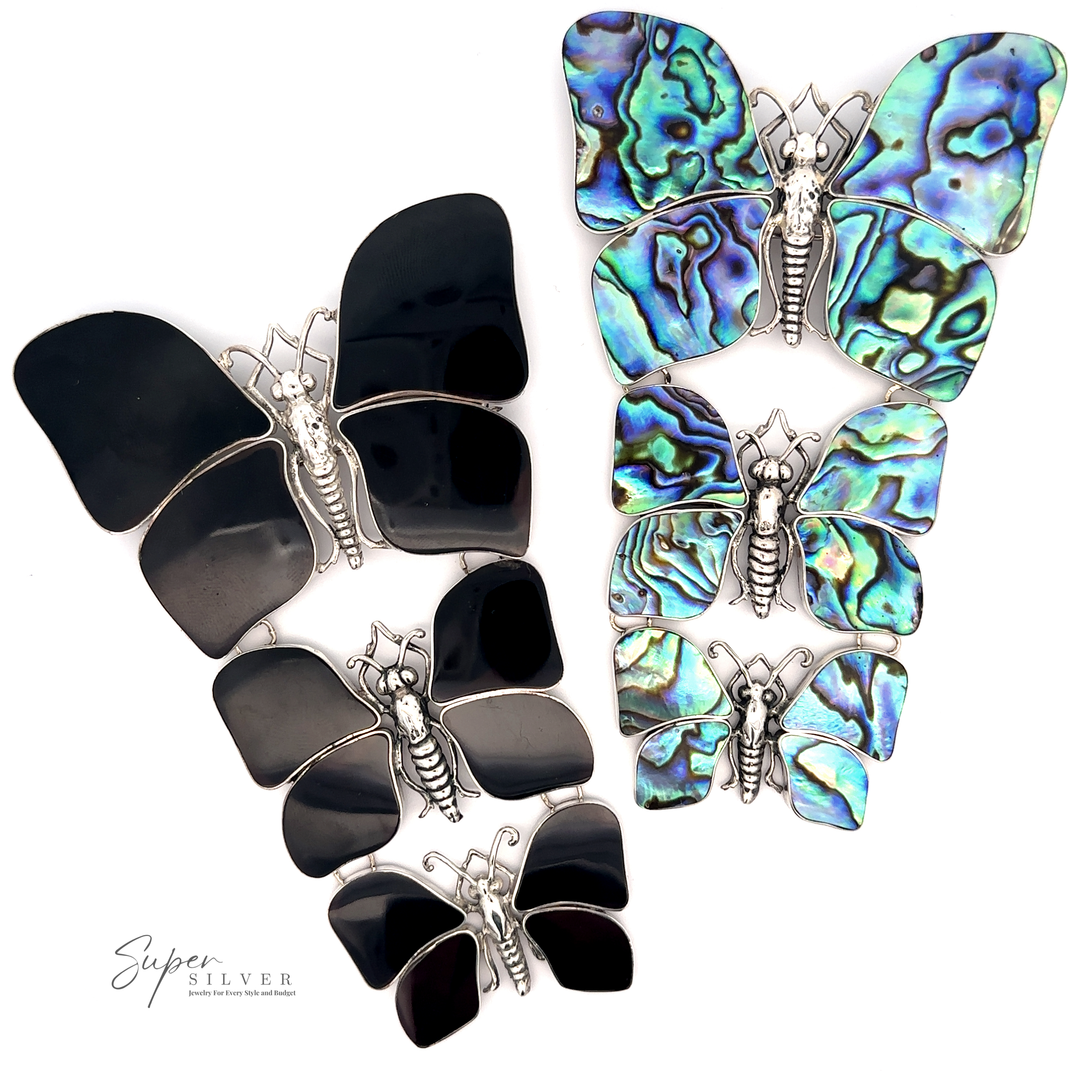 Three black butterflies and three iridescent abalone shell butterflies are arranged on a white background, reminiscent of the Statement Pendant or Brooch with Three Butterflies. The bottom left corner features the logo "Super Silver.