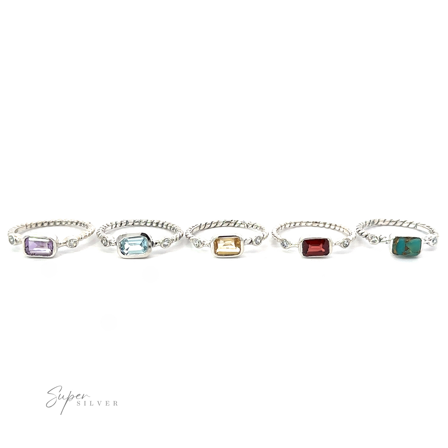 Five silver bracelets with various colored rectangular gemstones, each bracelet linked together, displayed on a white background, exuding sparkling sophistication.