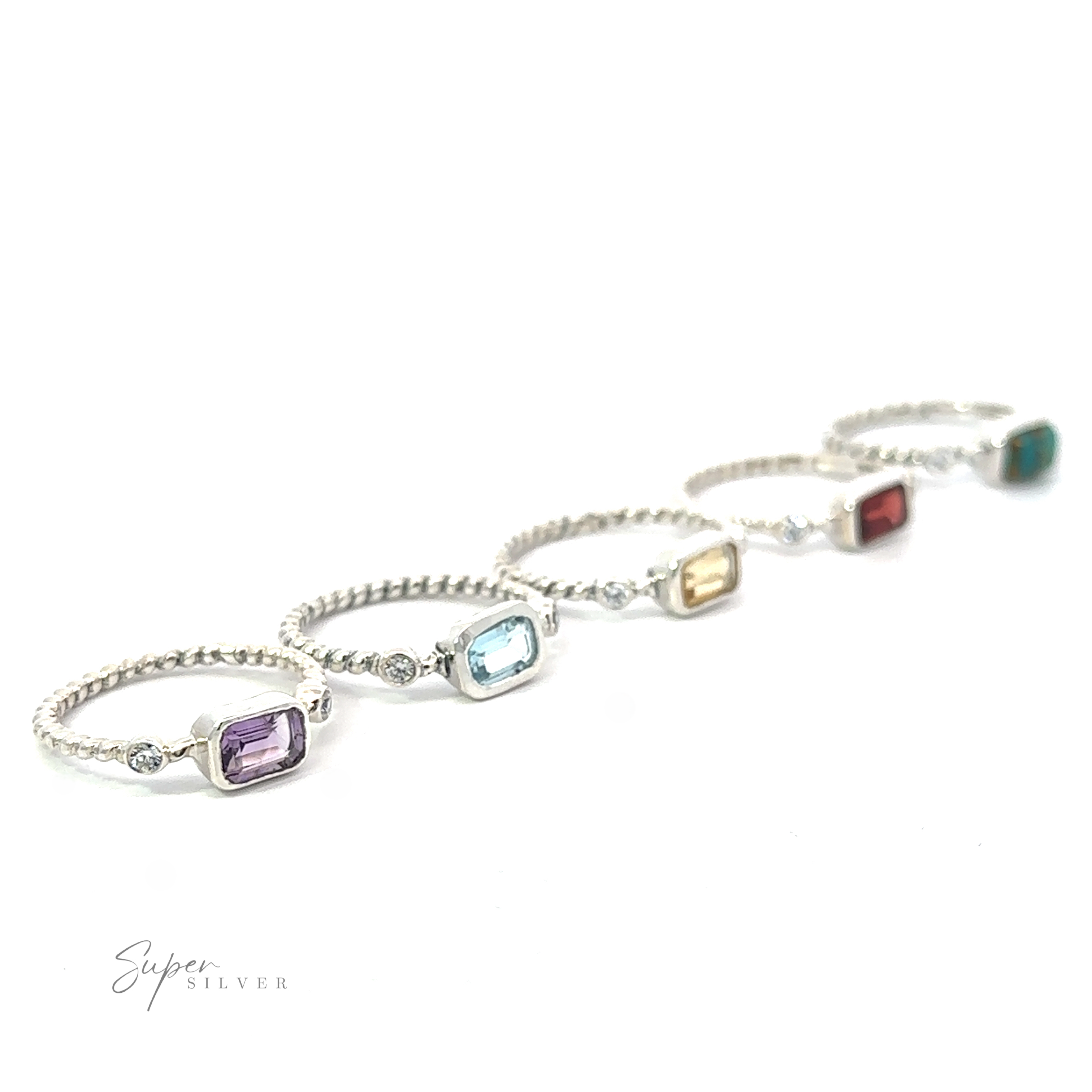 A line of five silver bracelets, each featuring a Rectangle Gemstone Ring with Twisted Band, sparkling with sophistication against a white background.